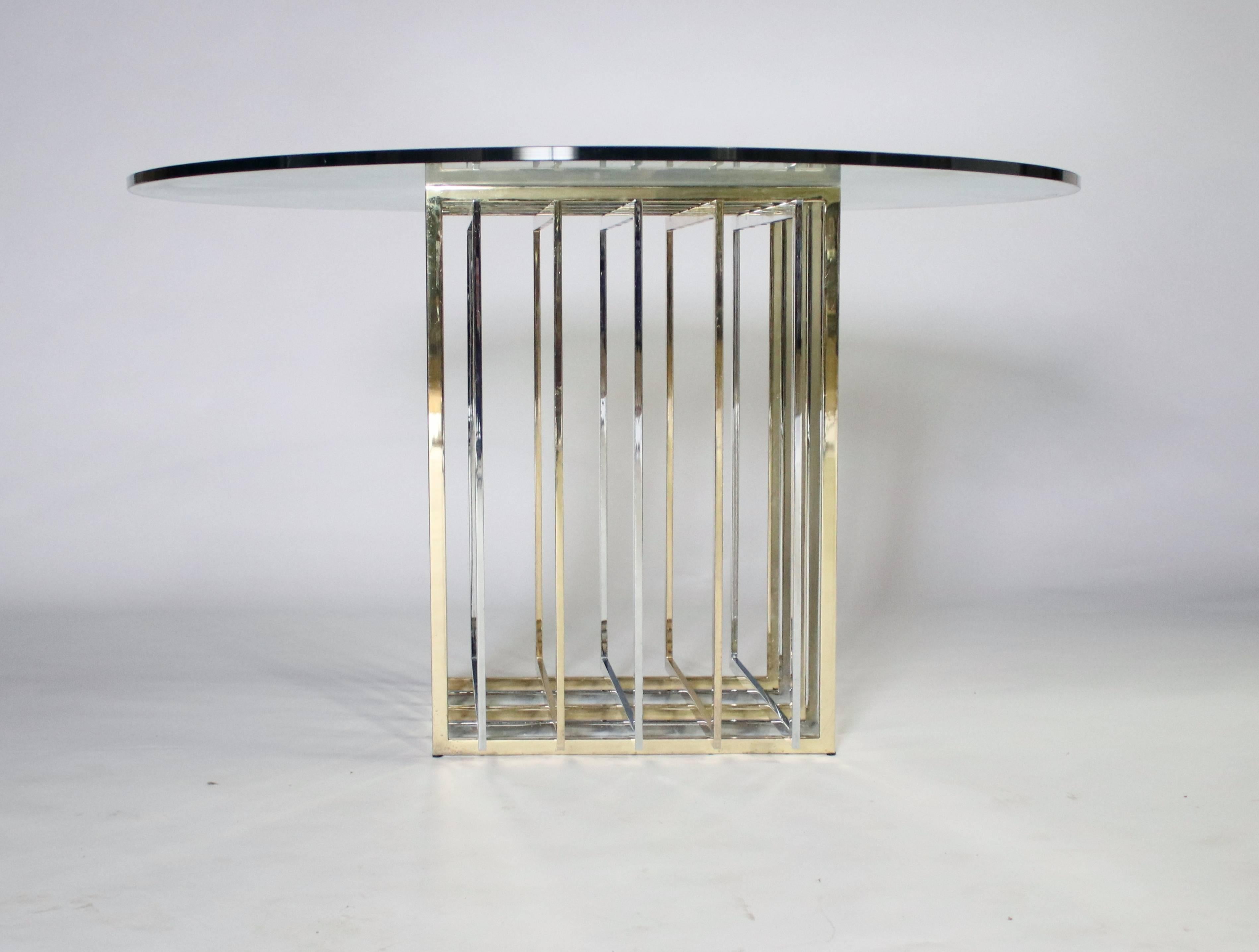 Classic 1970s grid design table by Pierre Cardin in polished chrome and brass. This table base can be topped with a round or square glass as shown in the pictures, or with a top of your preference. Contact us about shipping the base alone or with