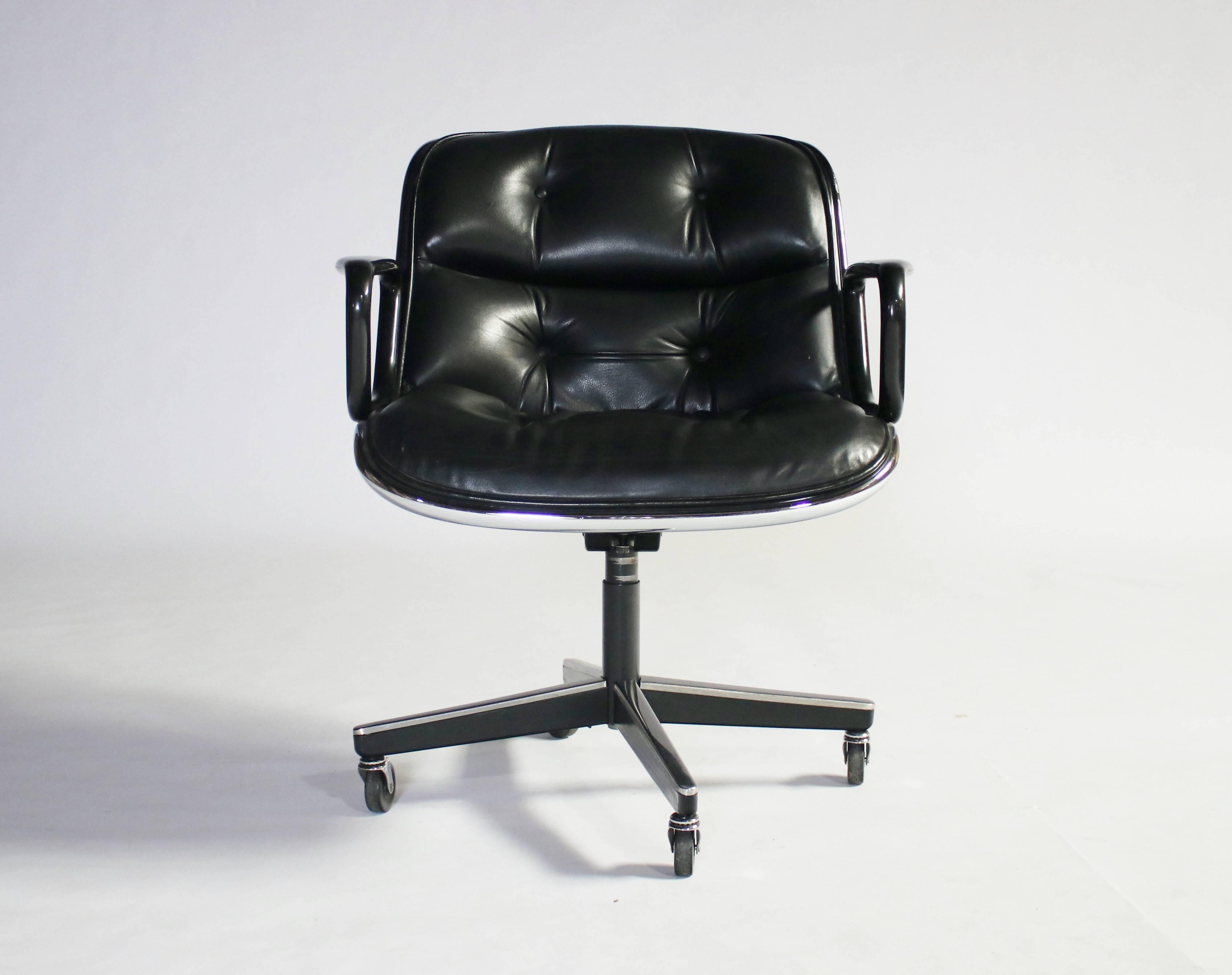 Vintage Executive armchair by Charles Pollock for Knoll on castors in black leather. Provenance and Knoll labels on bottom, dated 1988.