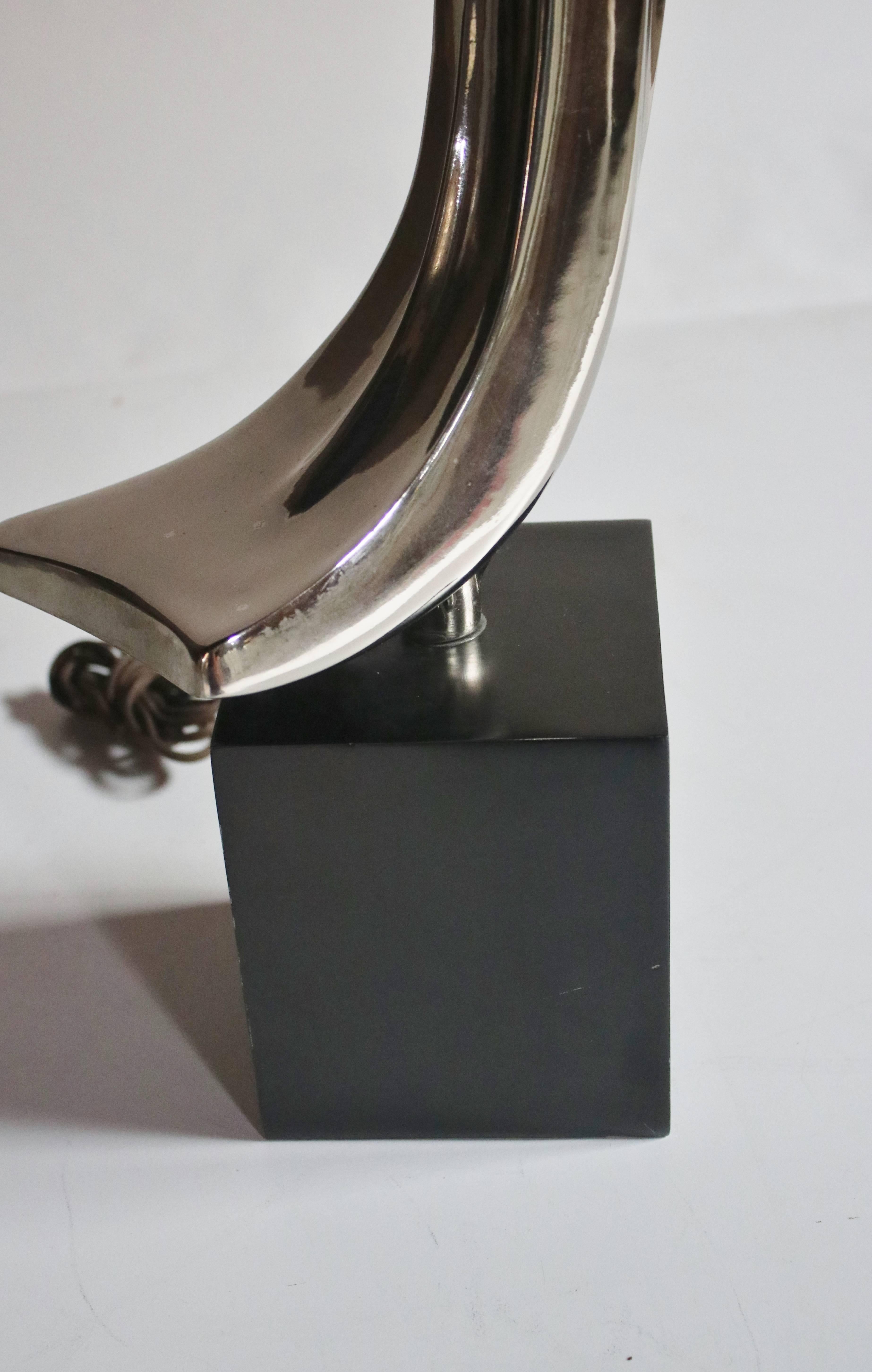 Chrome sculptural table lamp by Laurel Lamps Co. Wired and in good working condition includes harp, labelled.