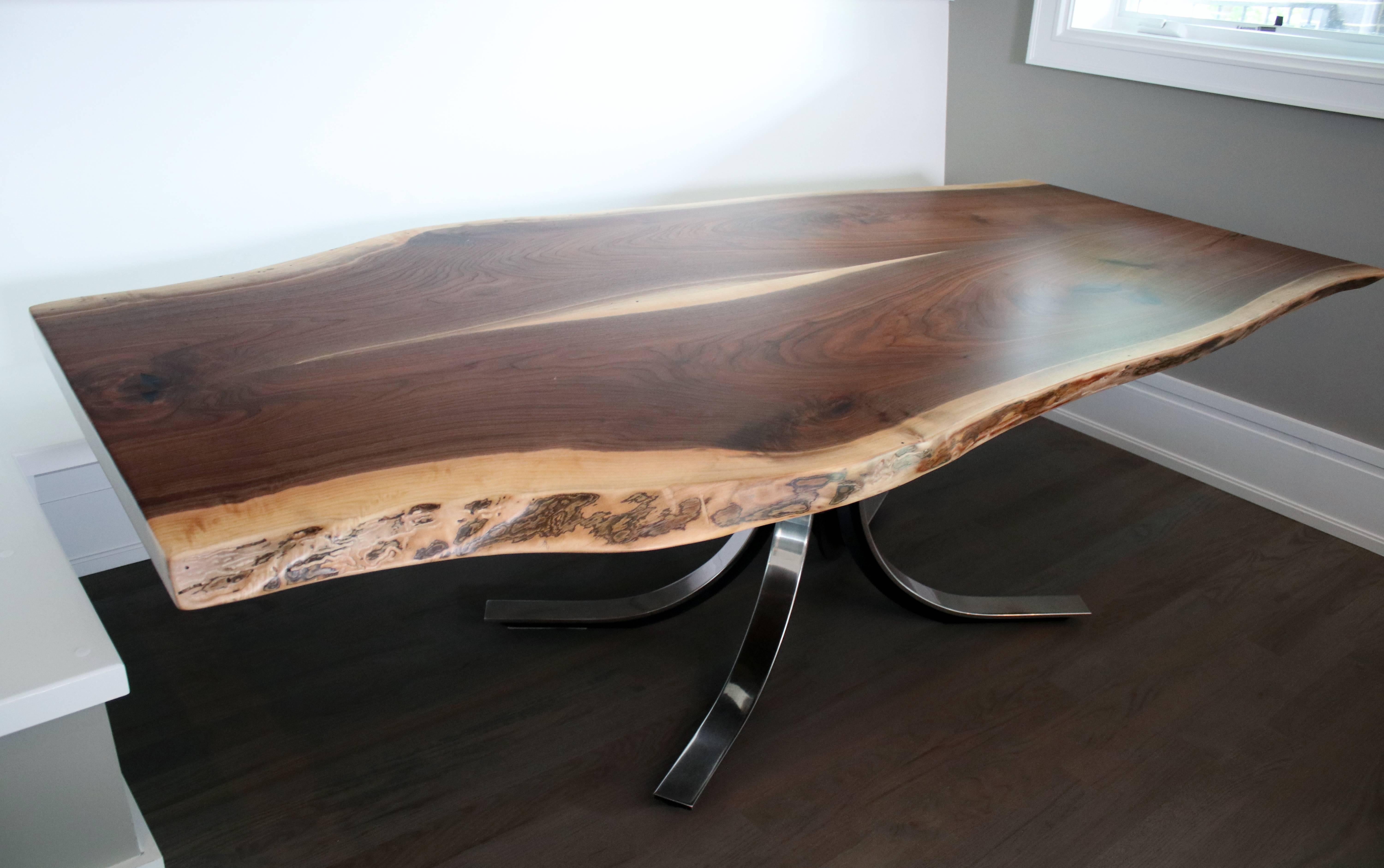 Midcentury chrome and iron table base by Osvaldo Borsani topped with a new Pennsylvania harvested walnut live edge slab. Truly one-of-a-kind table combining steel with organic live edge material.