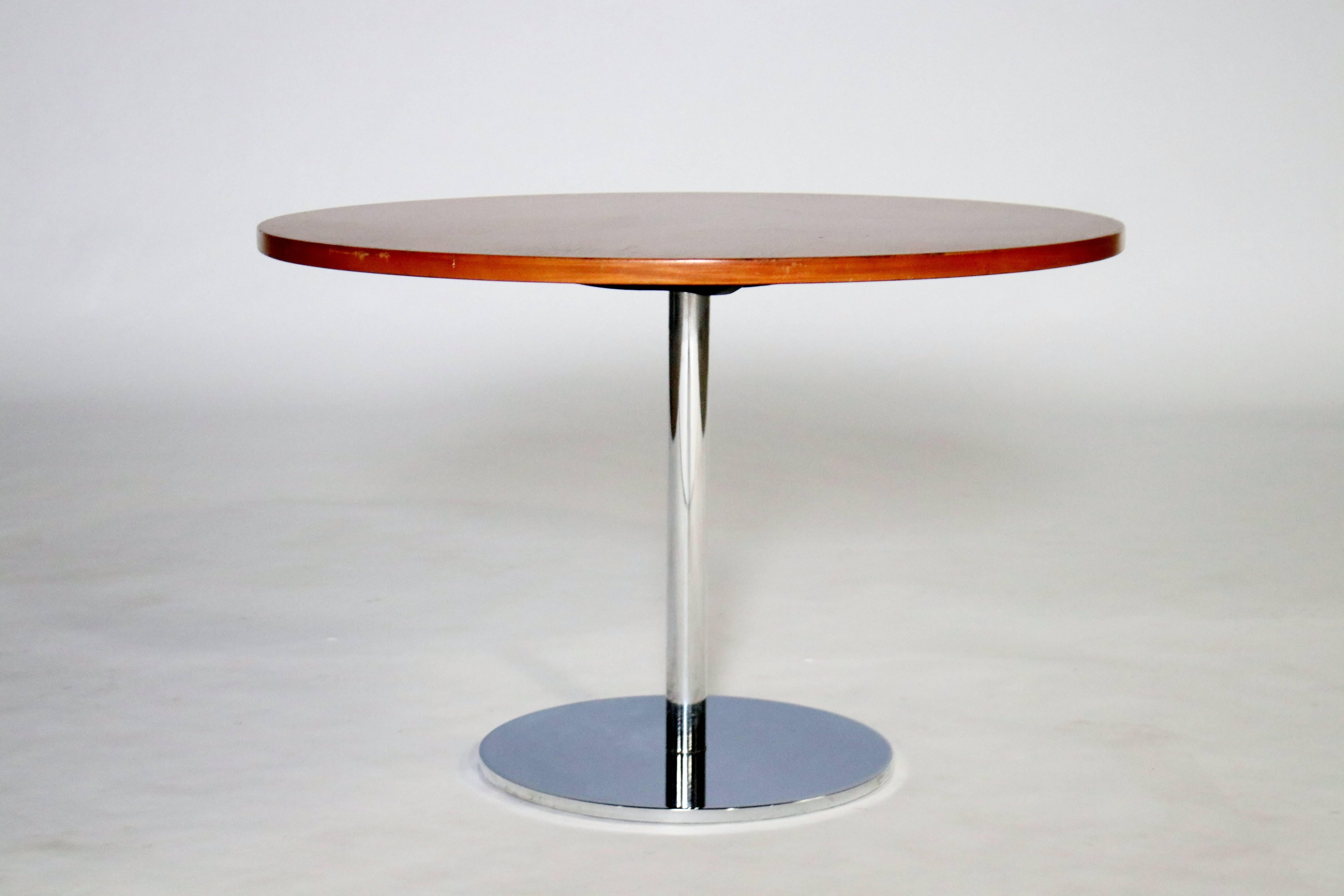 Occasional or side table design by Hugh Acton in chrome steel and walnut top.