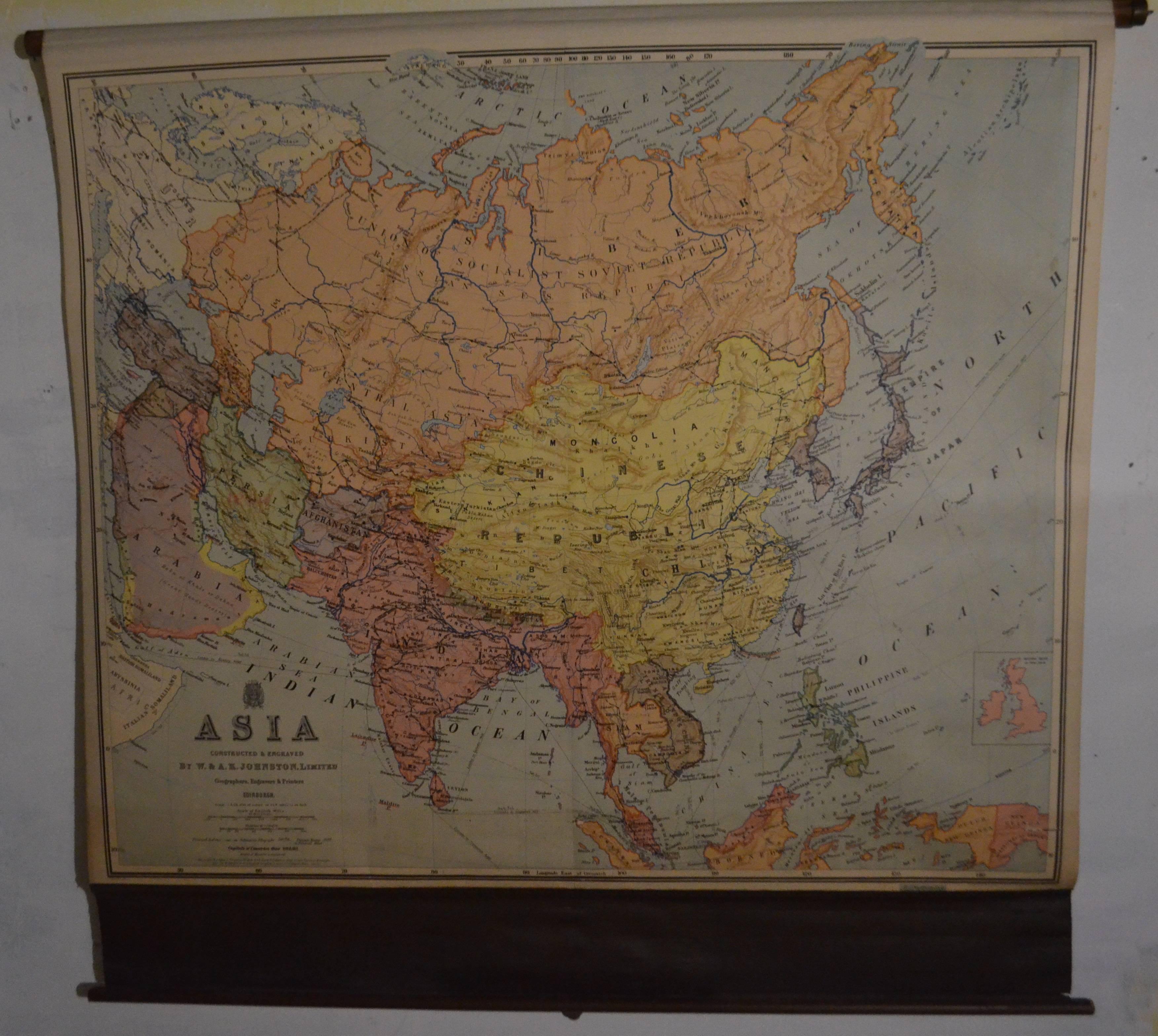 Map of Asia from the early 1900s. Constructed and engraved in Edinburgh, Scotland and mounted on a retractable wooden roller. Beautifully rendered in illustrative detail and subtle range of soft colors.