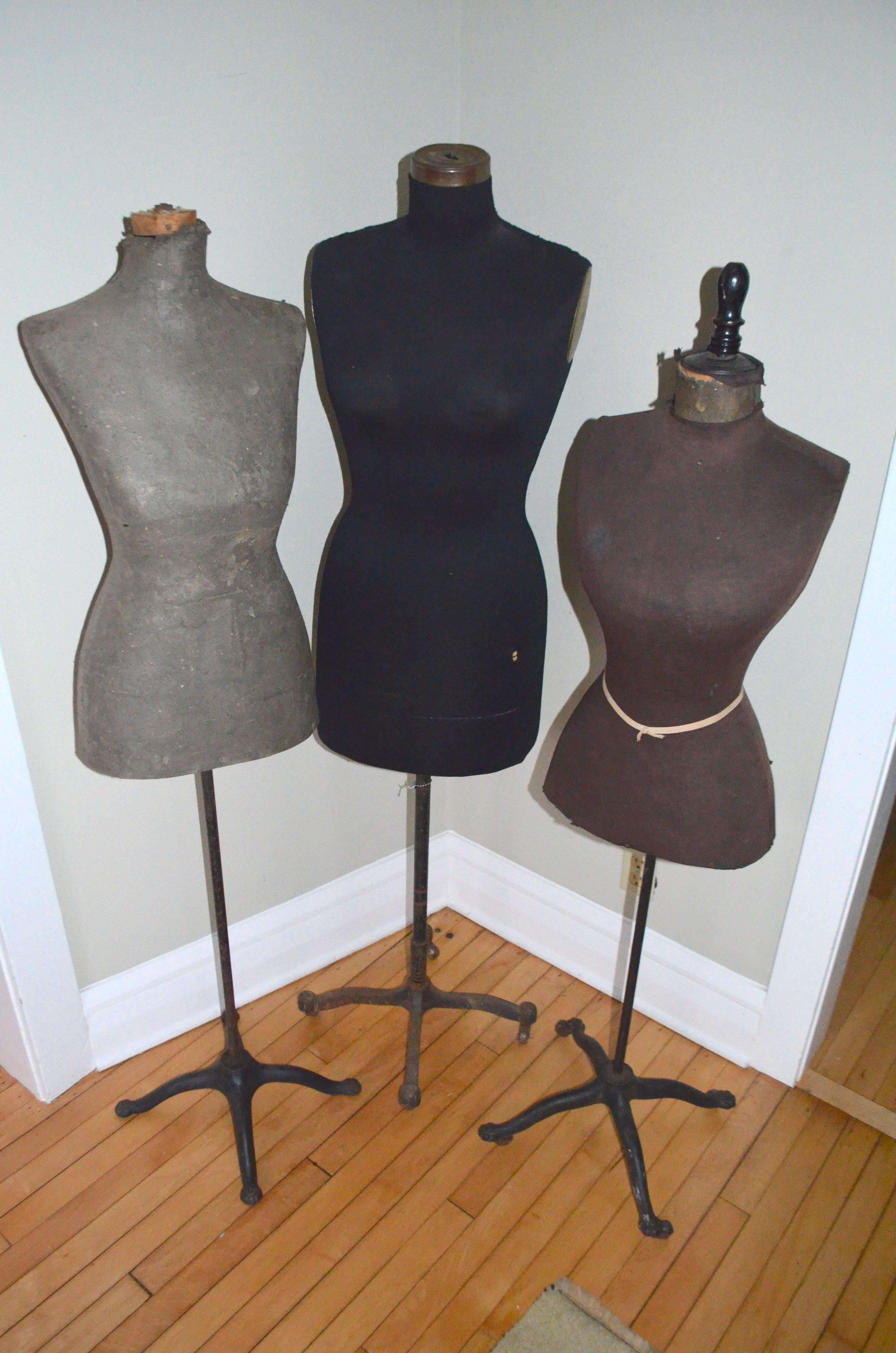 Mid-century, adjustable-height, seamstress dress forms. Sold as a set of three. These ladies make quite the stunning trio with their varying subtle coloration and the visual joy of their bodily curves. Simple elegance and sophistication personified.