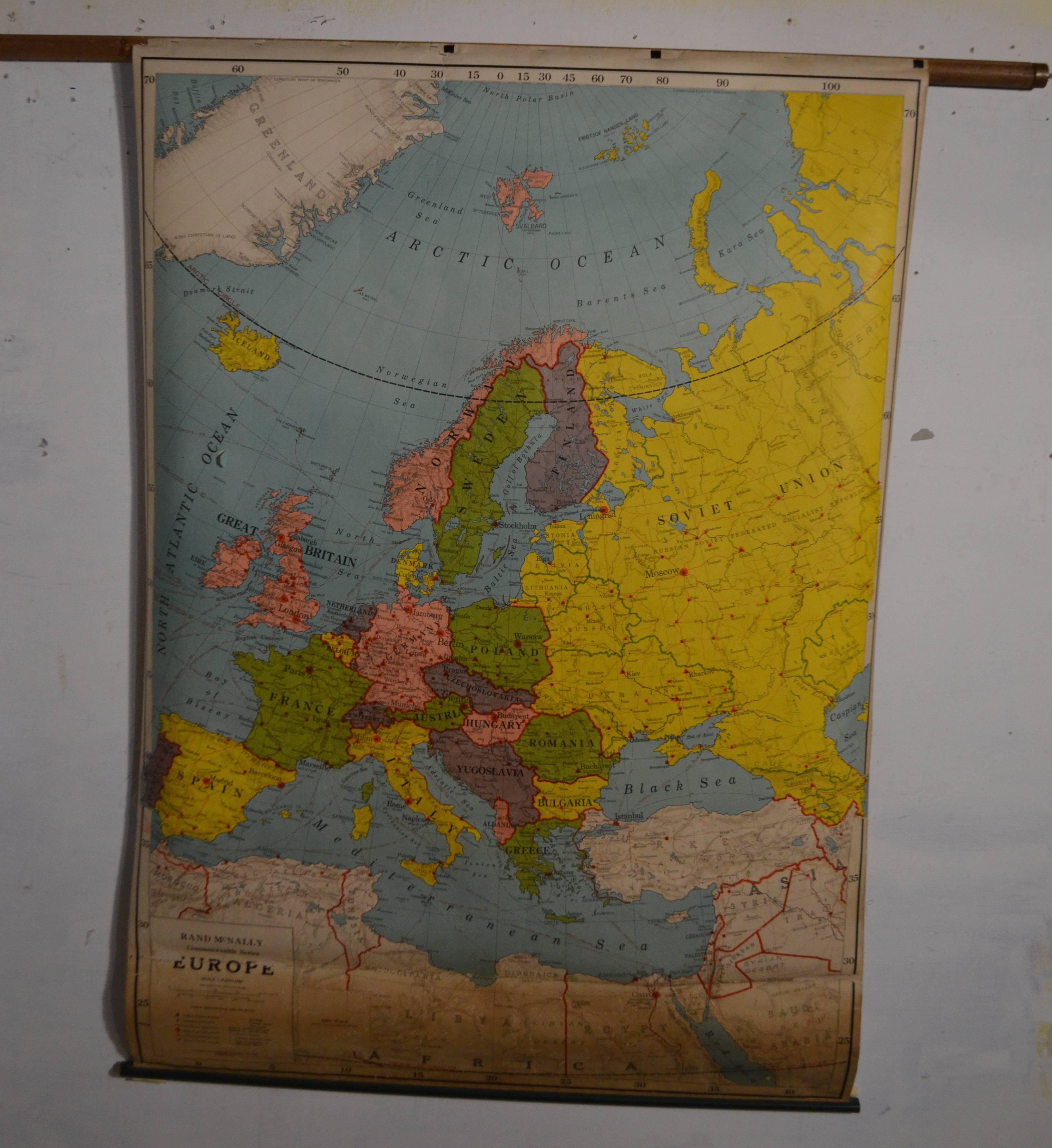Map of Europe on retractable roller. Vivid colors. Engraved and printed in Scotland. Pre-World War II.