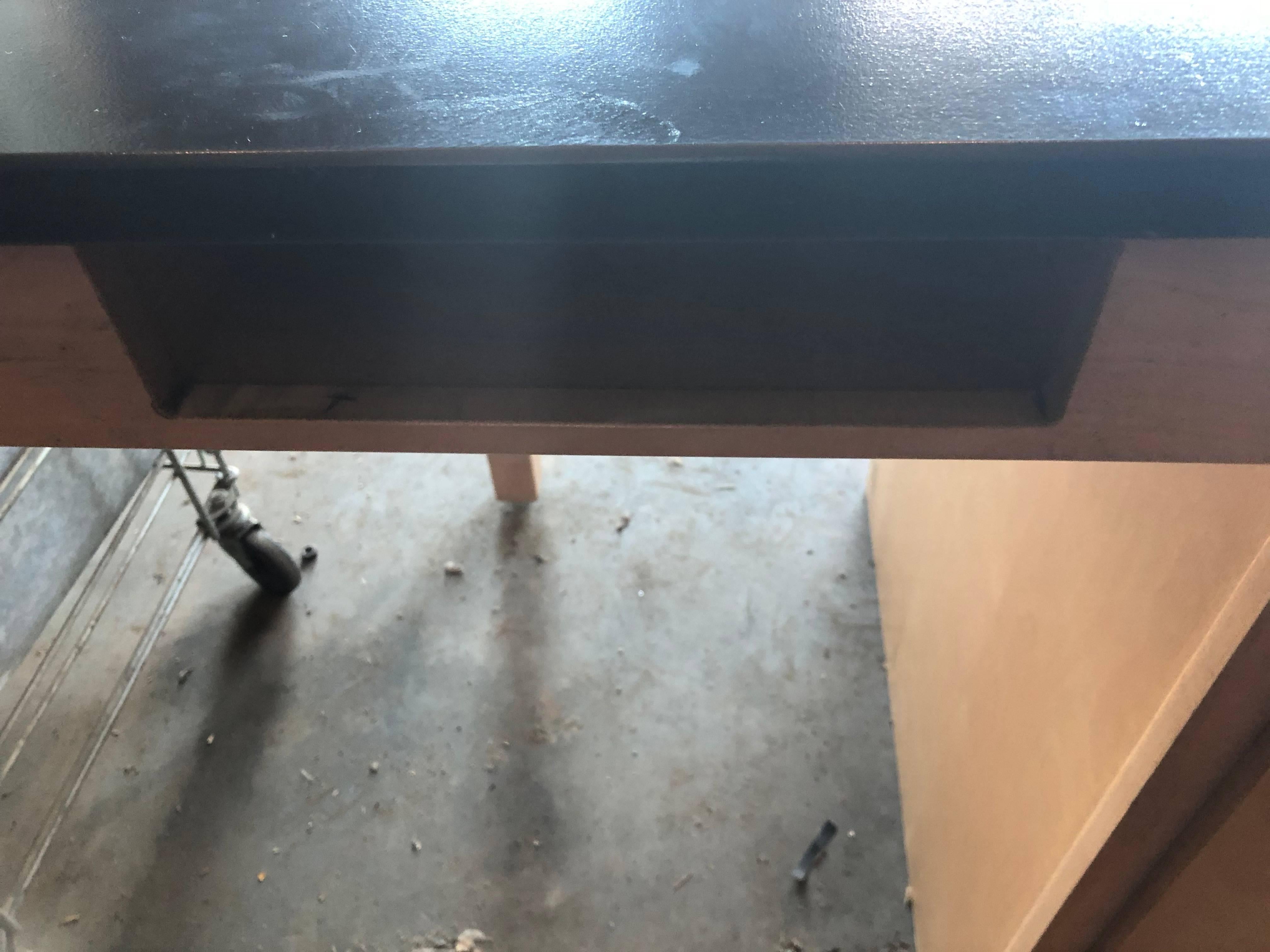 Industrial/lab table from chemistry lab in Midwestern High School, circa 1990. Heavy-duty with minimal use. Table for two students with two drawers and bookcubbies. Extraordinarily good, vintage condition. Would make a striking center island and