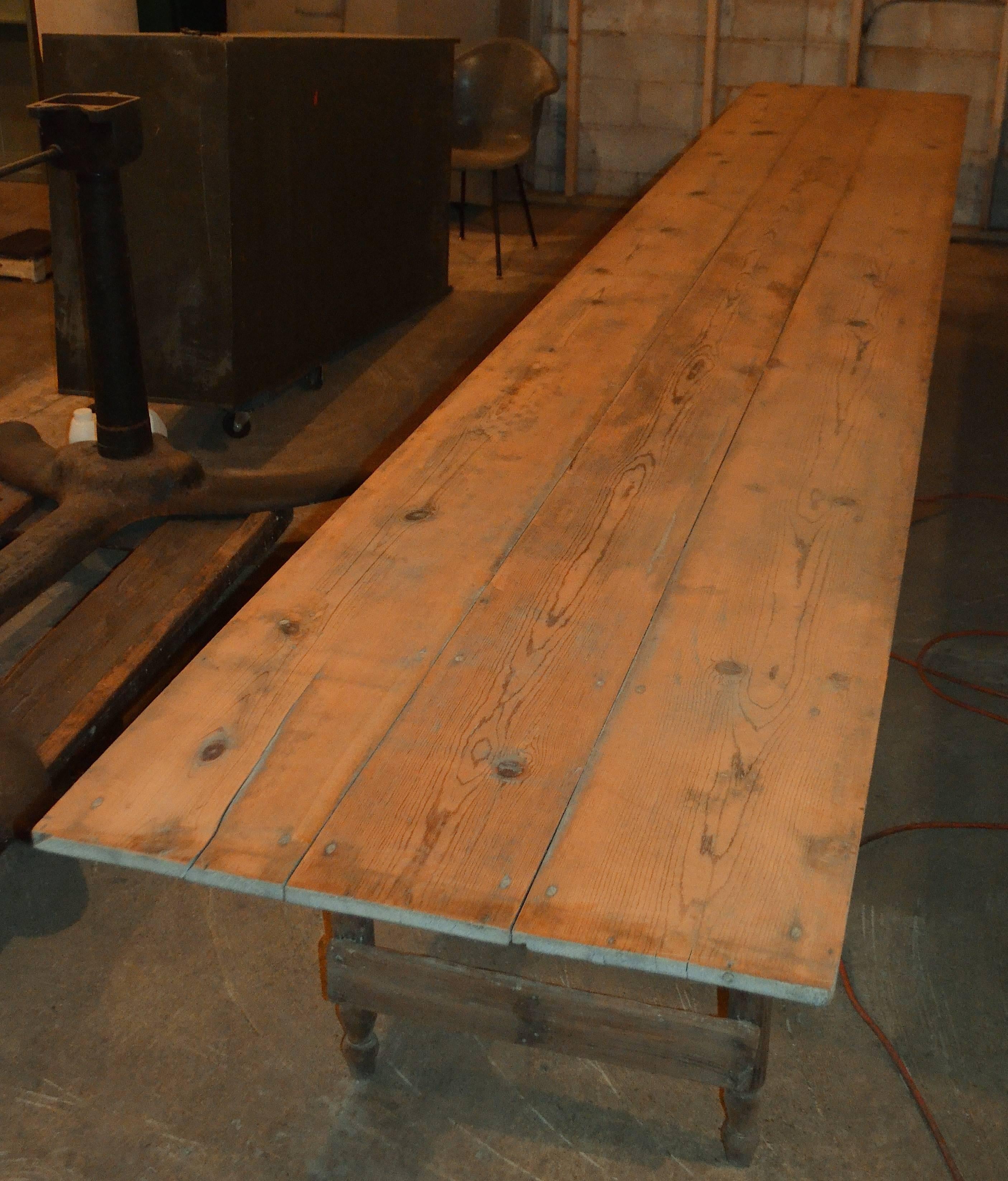 Speaking of summer parties and reunions, this harvest table that can easily accommodate 20-25 guests. More than sixteen feet in length, amazingly rock solid, no sway, no way. The legs are lathe-turned and the grain of the pine board is gorgeous. 16