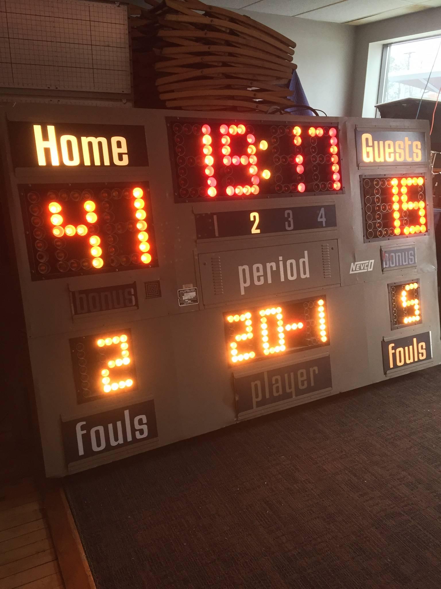 Scoreboard for high school basketball from the midwest, circa 1990s. Excellent working condition with control panel. Lights, action, foul. And a great, working Horn! Not much beats the excitement level of high school basketball. Listing is for one