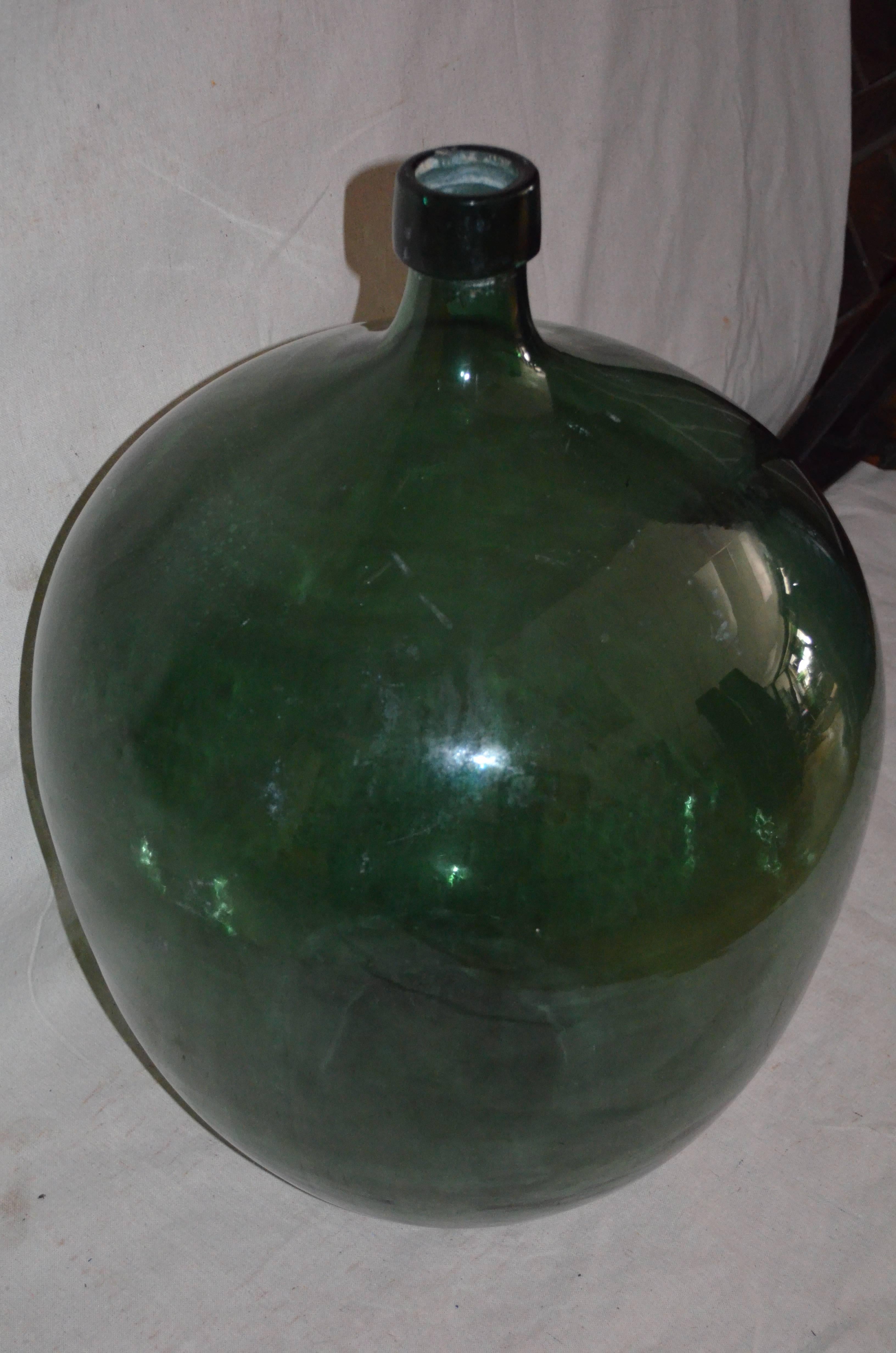 Mid-Century Hungarian demijohn wine jug with size and a shapely presence, two feet tall and 18