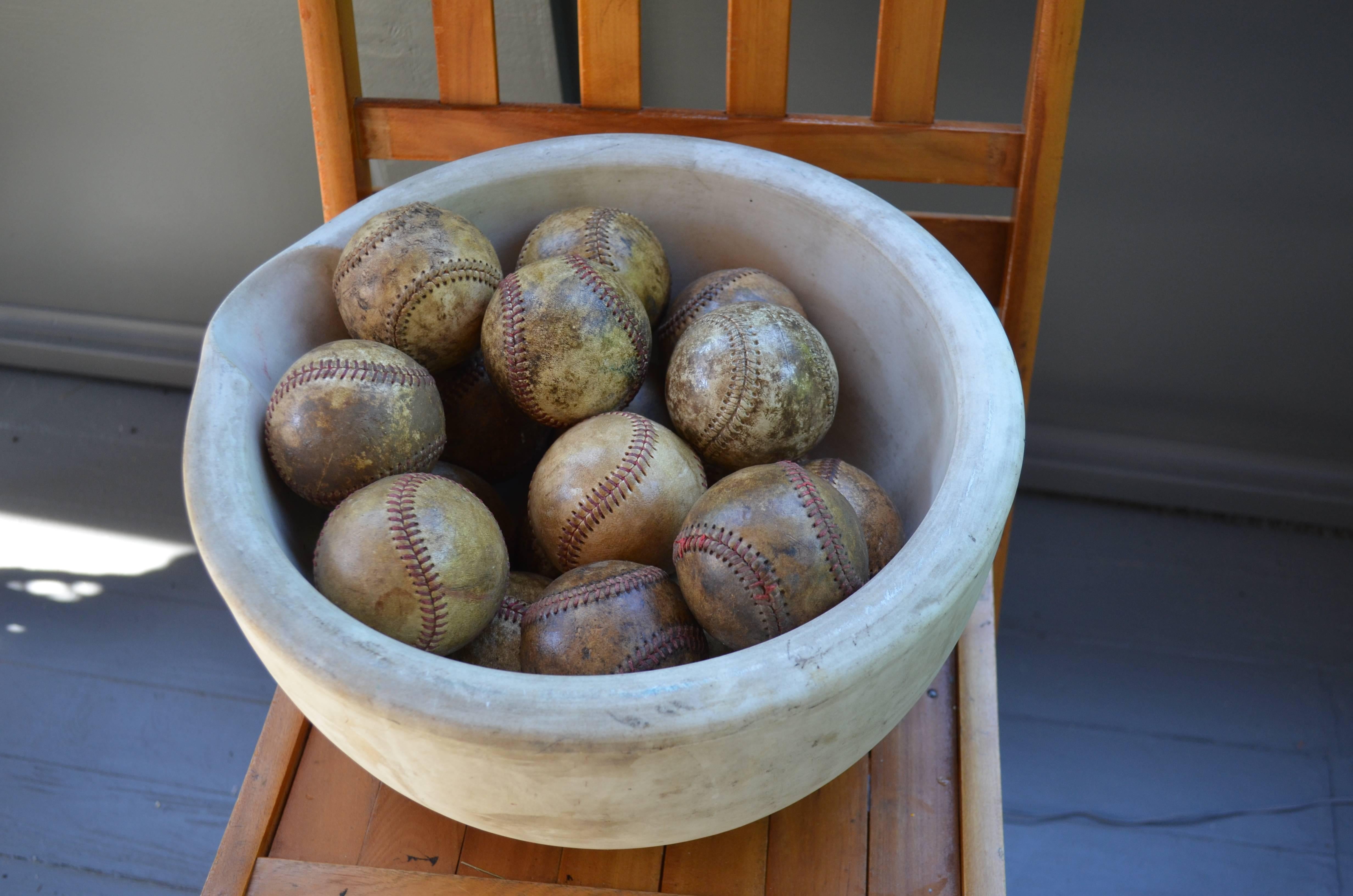 North American Mortar Bowl of Antique Stone with Display of Well-Worn Baseballs