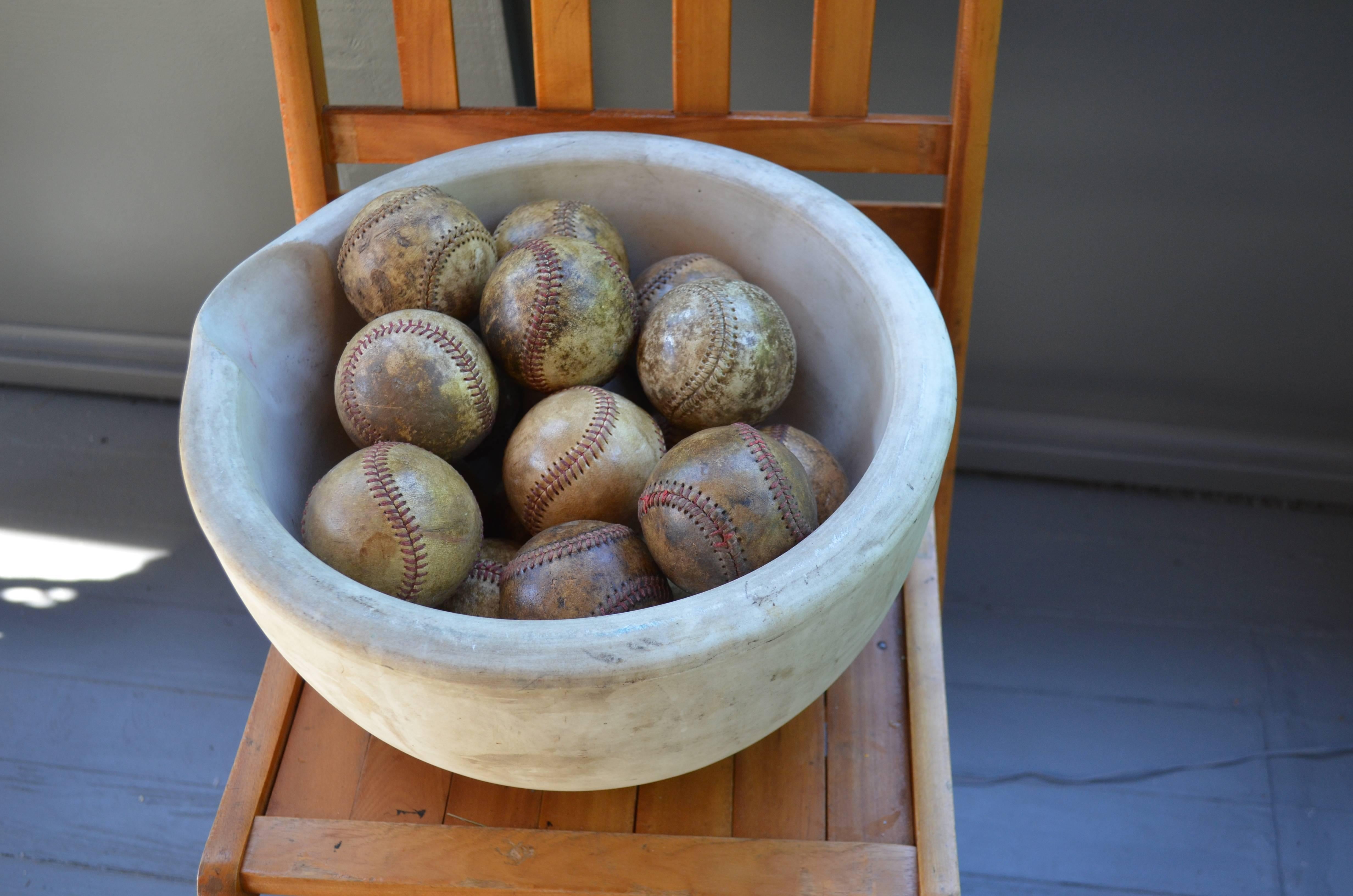 Mortar Bowl of Antique Stone with Display of Well-Worn Baseballs In Excellent Condition In Madison, WI