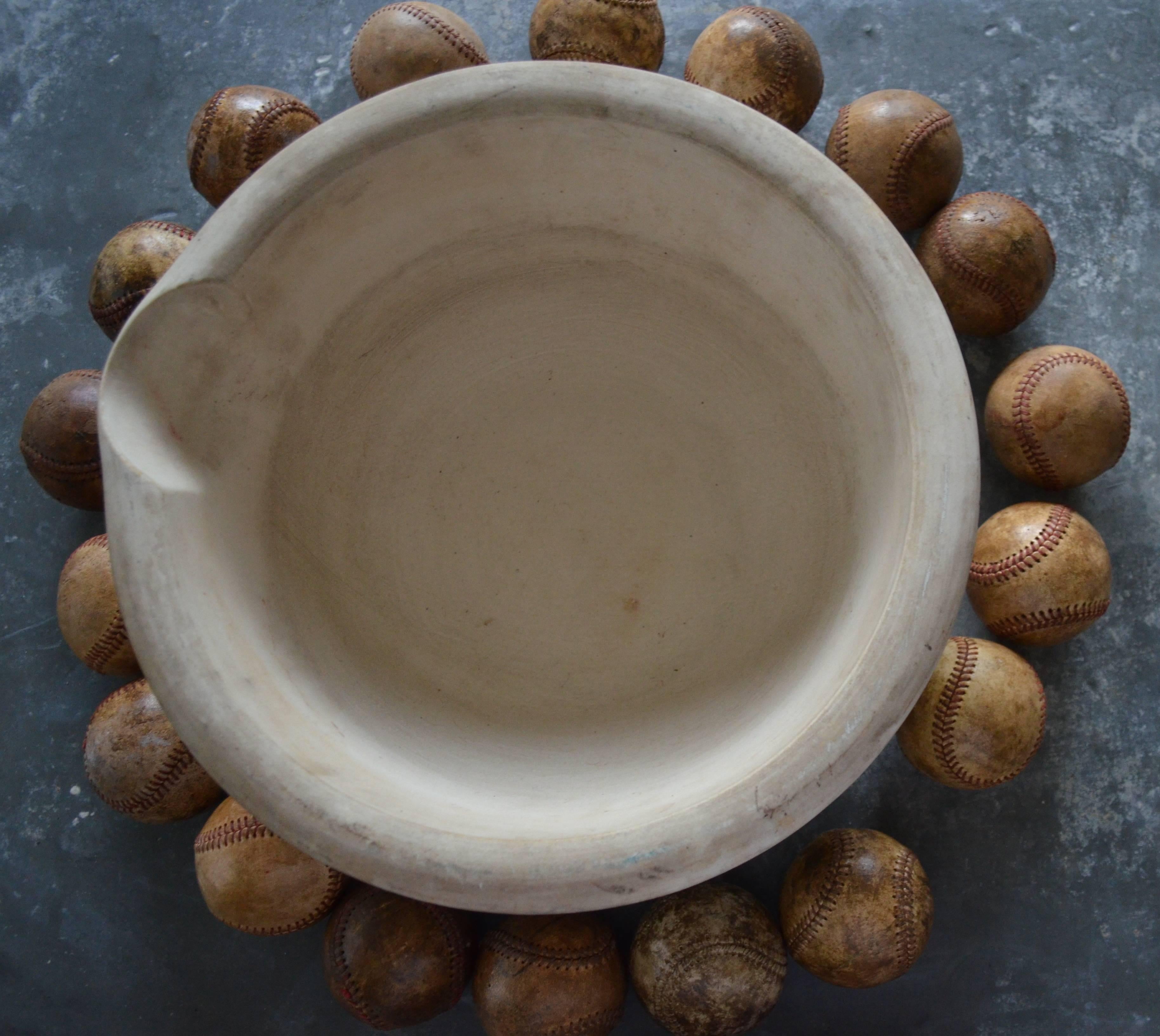 Mortar Bowl of Antique Stone with Display of Well-Worn Baseballs 1