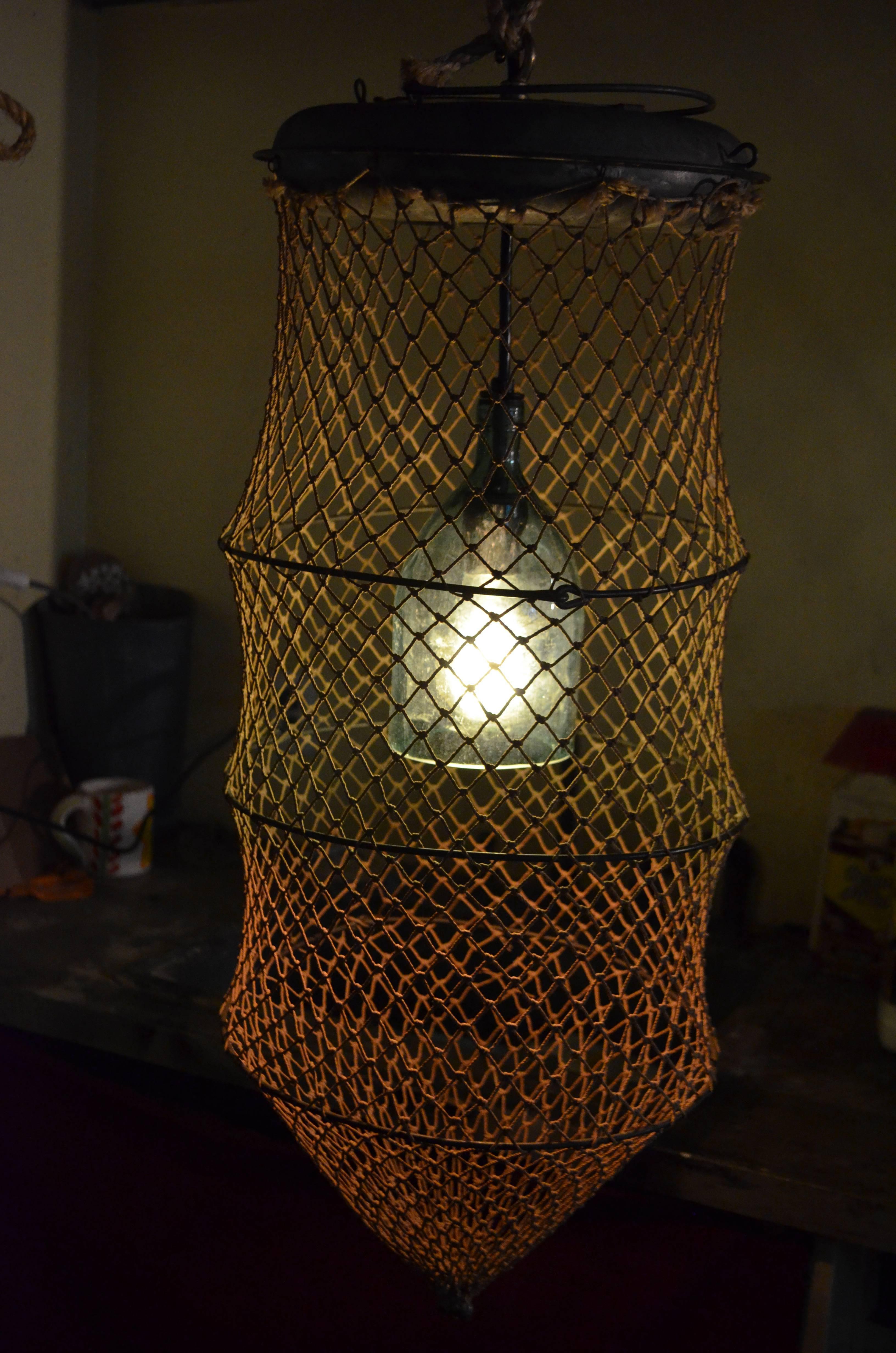Pendant Light from Seltzer Bottle Mounted Inside Fish Trap 2