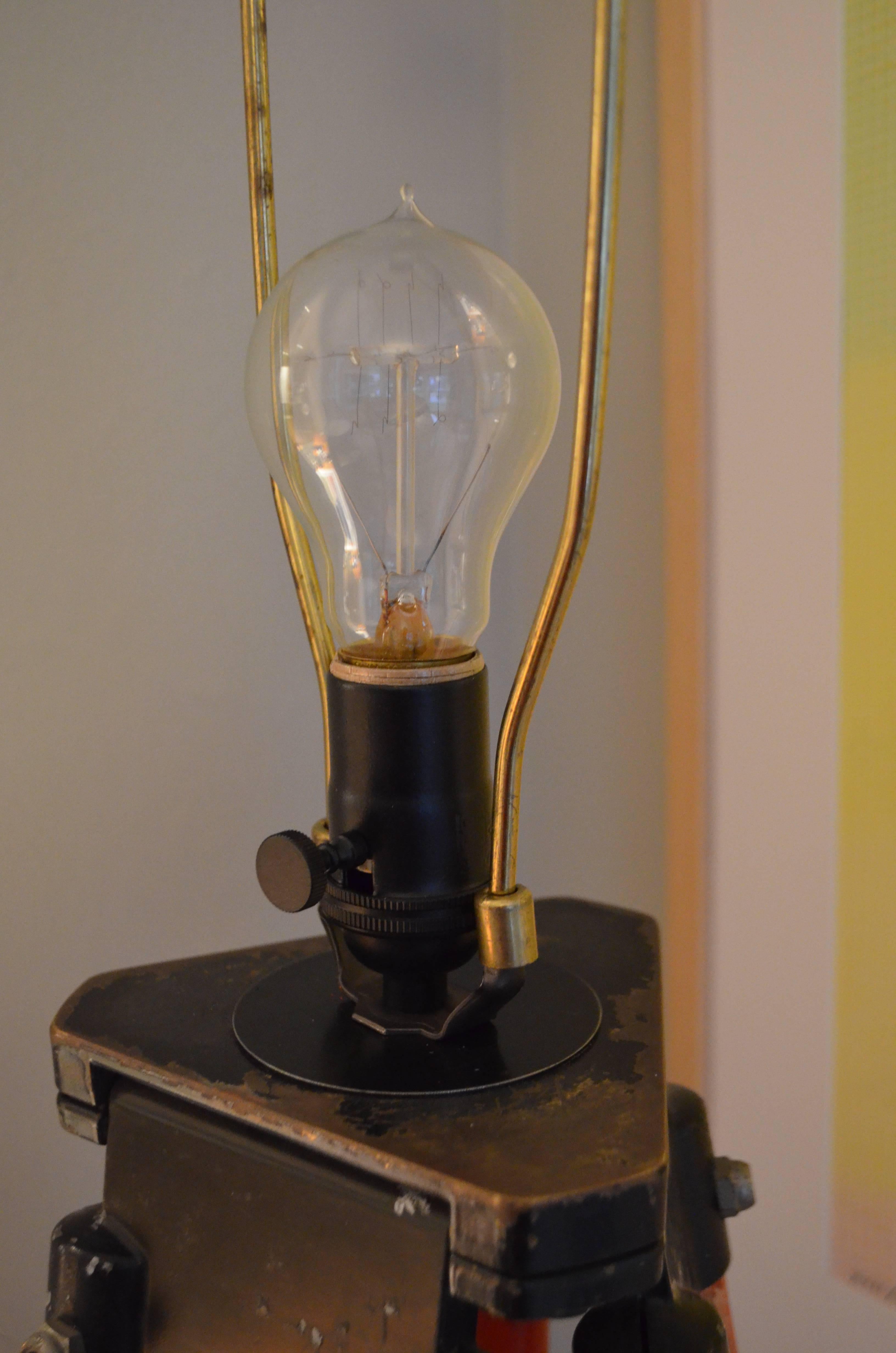 20th Century Floor Lamp Created from Surveyor Tripod in as-found Orange Paint