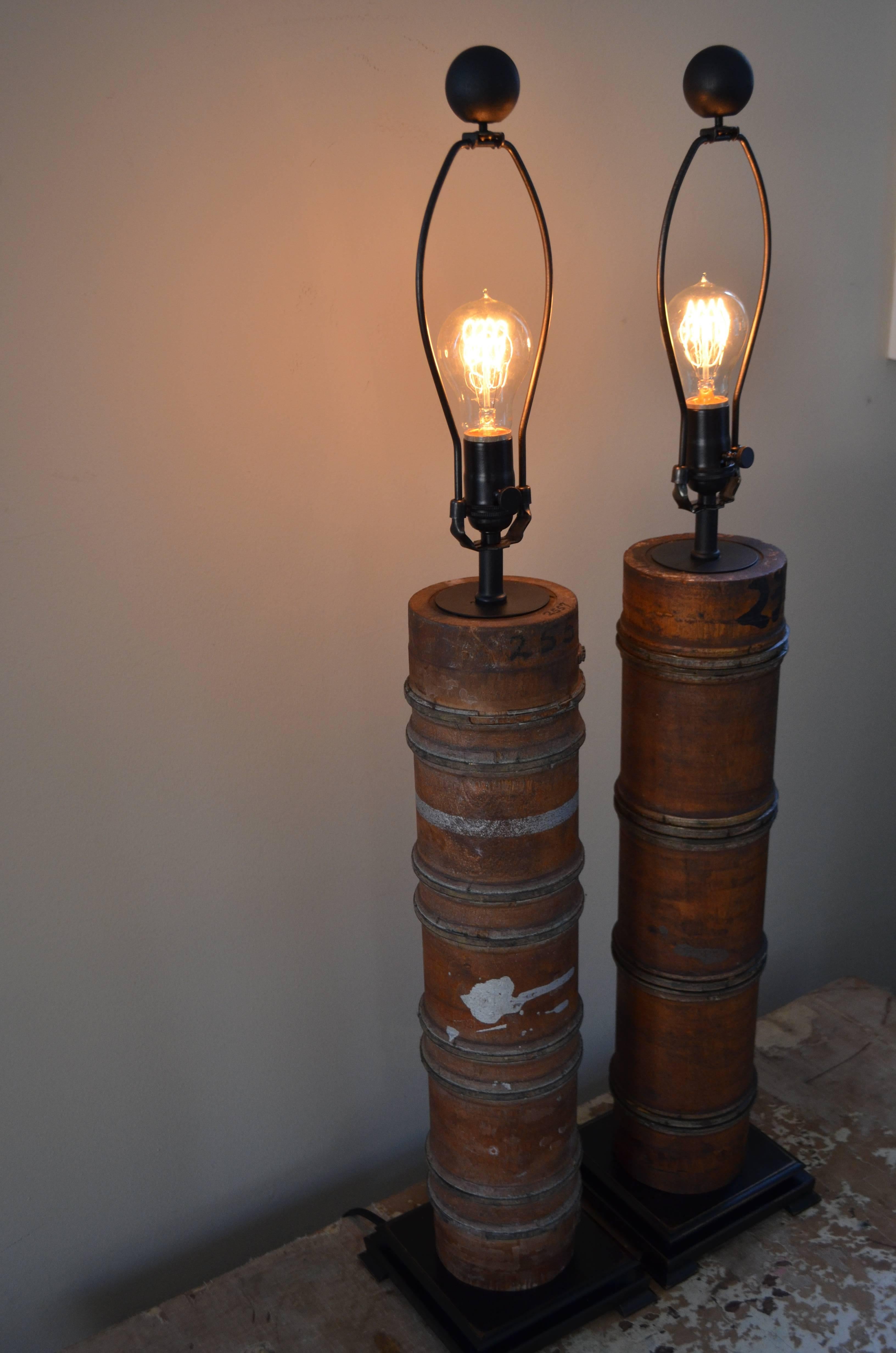 Pair of table lamps created from rollers used to print wallpaper in the late 1800s.  Mounted on hand-crafted, distressed maple bases, these lamps were professionally-wired with UL-approved components including three-way brass socket (150 watt