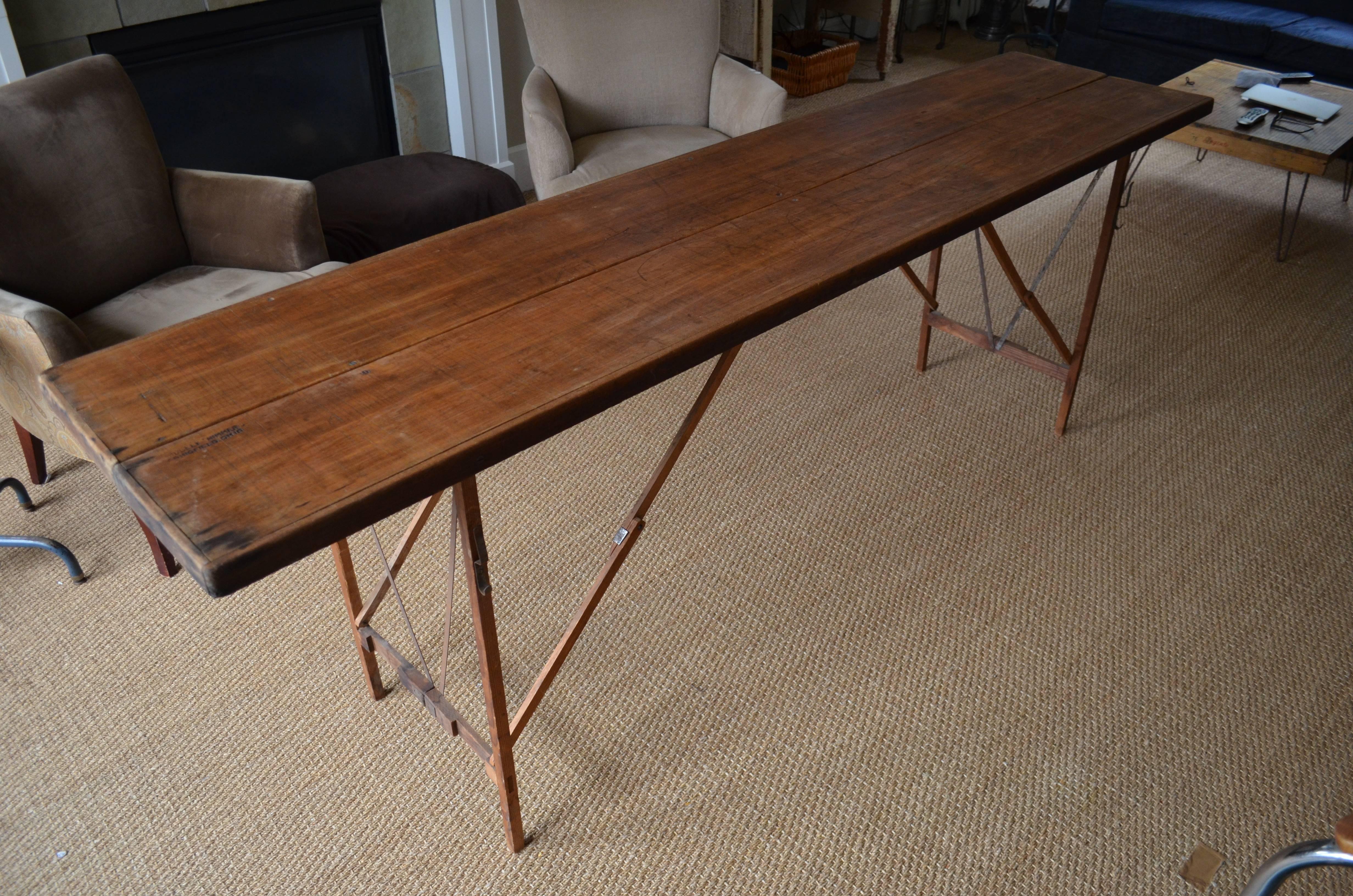 Industrial Folding Wooden Table Used by Wallpaper
