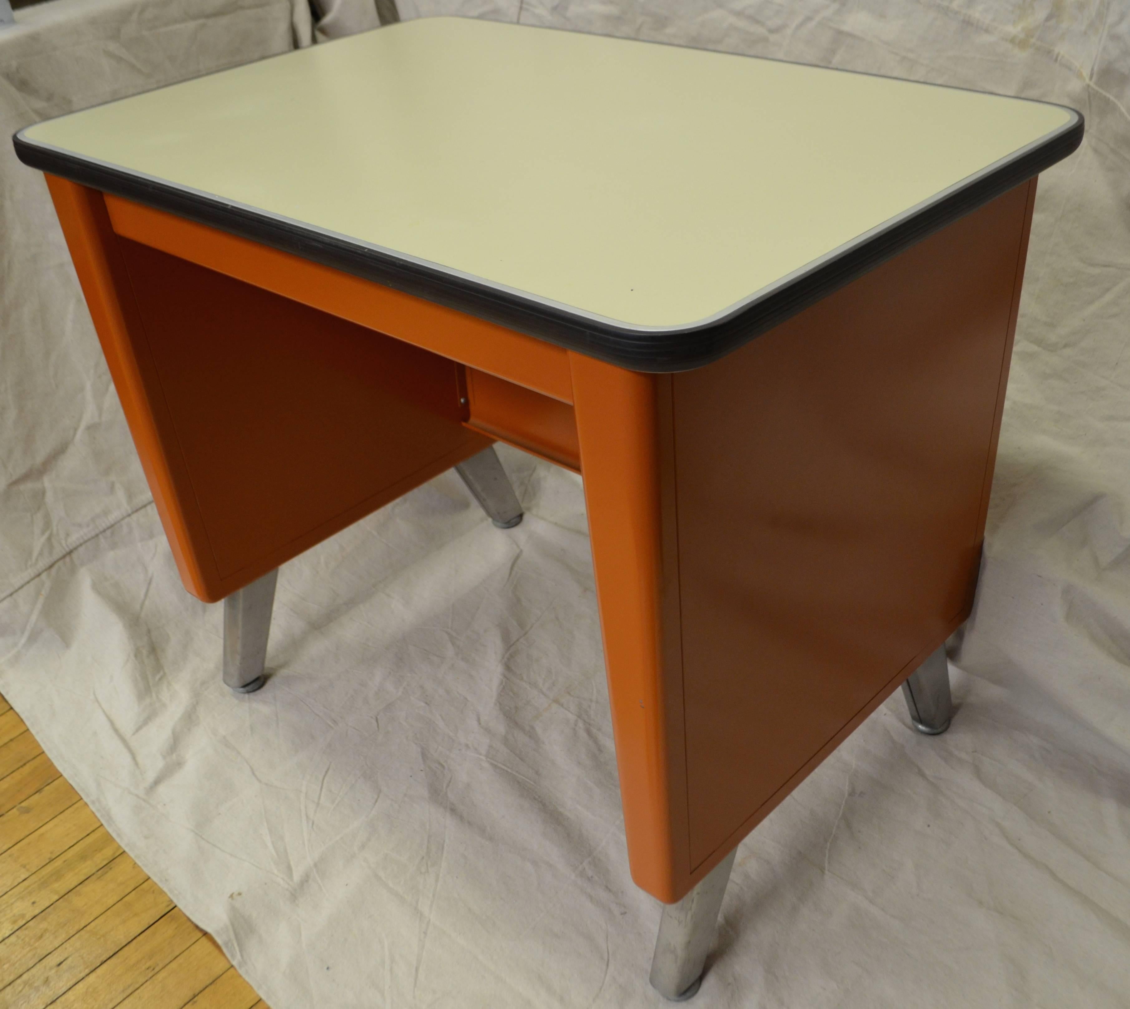 Tanker desks were one of the hottest things going (and the heaviest) in Mid-Century office decor. This version we’re calling the mini-tanker. Immaculate condition. Lightweight for easy moving and relocation around the home. Fits nicely in its own