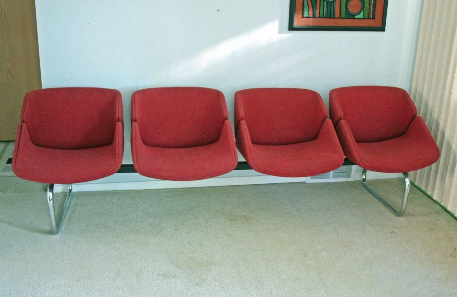 Vintage original Thonet tandem bench with four chairs. Of note: color is more of a soft brick red - not the bright red seen in lead photo. The second sidebar photo (straight on front view) shows reasonably accurate color. Very