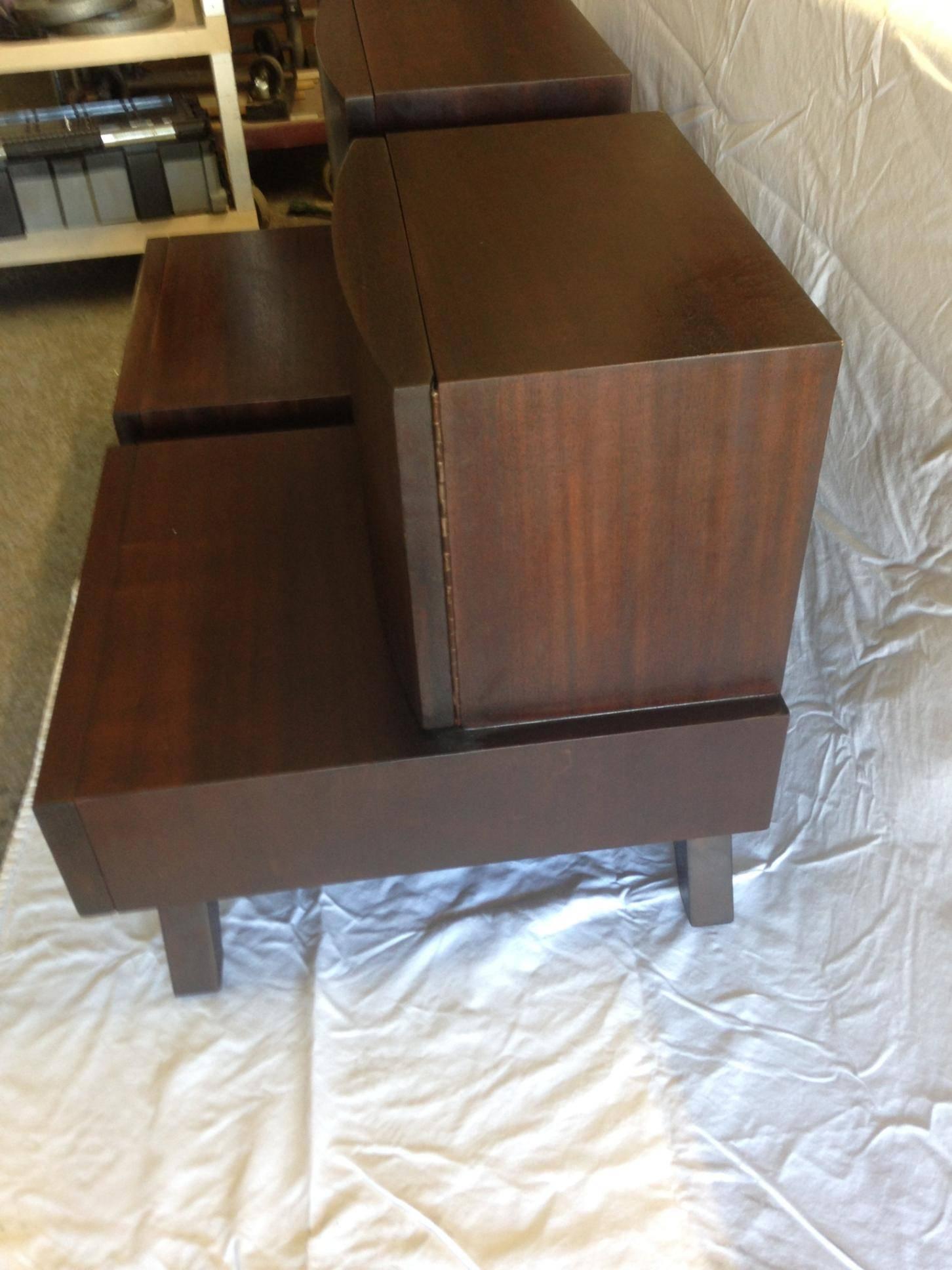 Pair of Mid-Century, wooden bedside/end tables. Large, hinged-door cabinet is 11