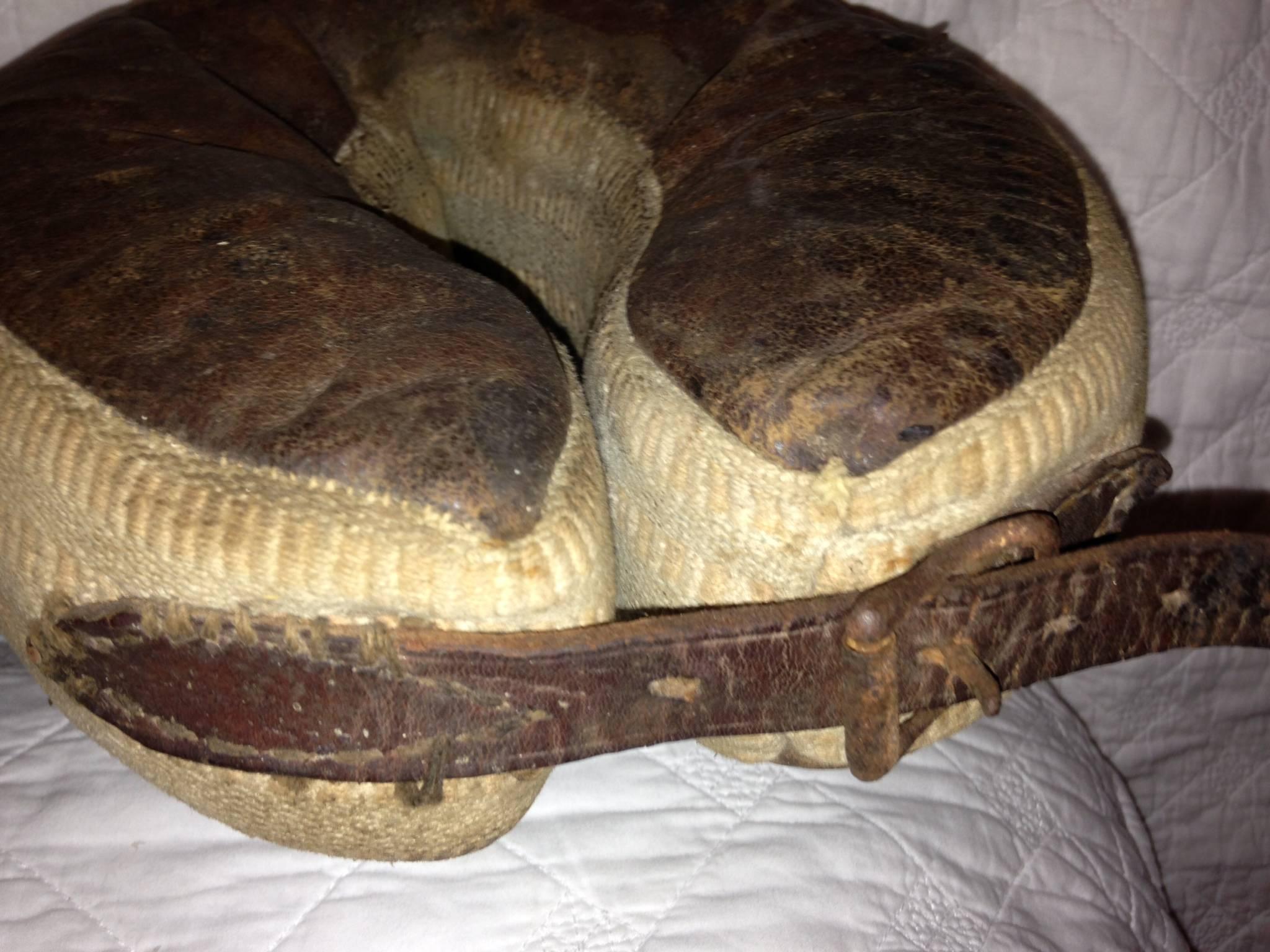Pair of late1880s leg protectors for race horses. Prevented bruising or agitating of the horse's legs while lying in its stall. Made of leather and canvas. A horse lover's dream artifact. Extremely rare.