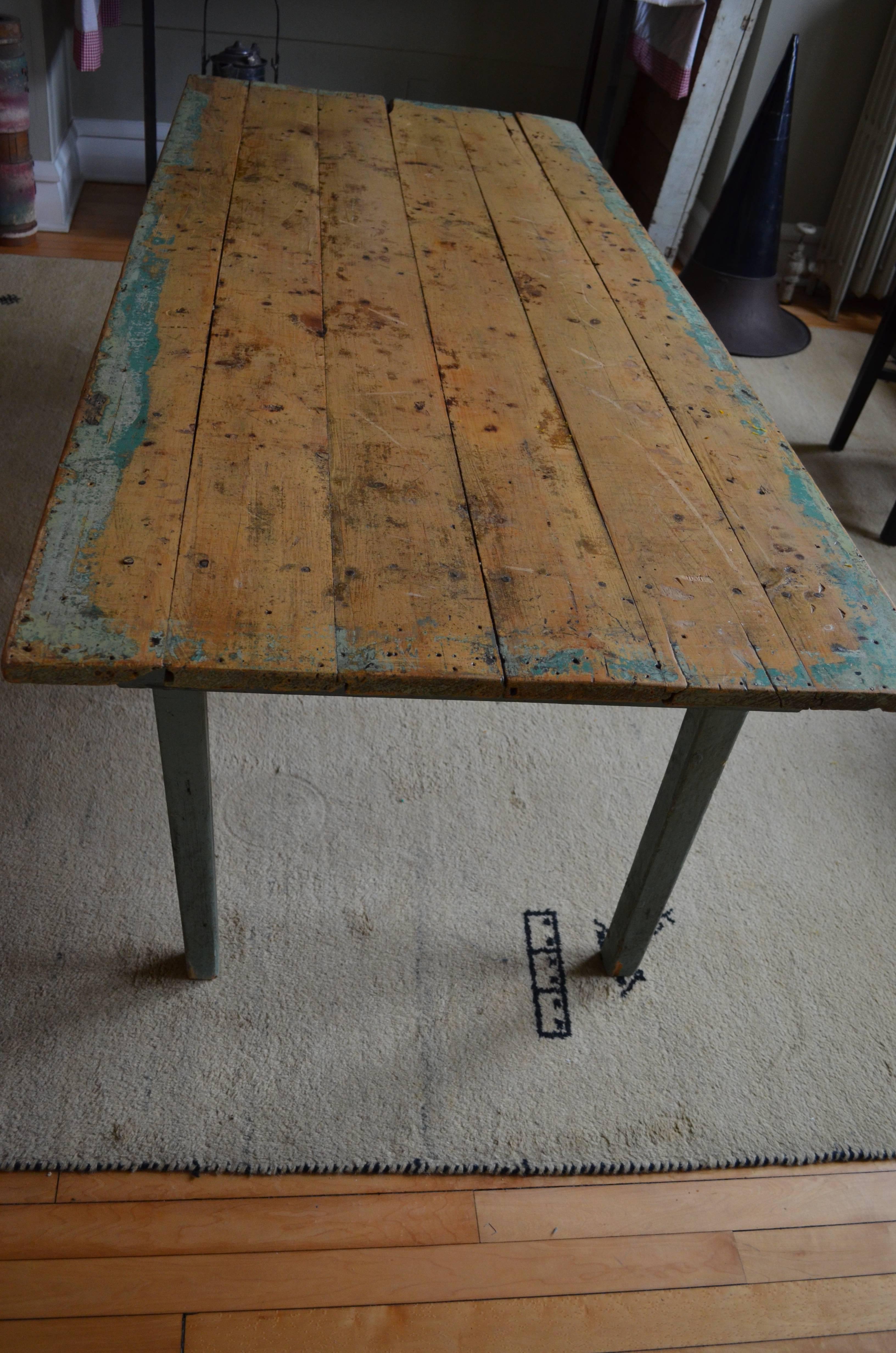 Vintage wooden table was used in early 1900s schoolhouse. Height of 23.75 inches is perfect for younger children. Great for doing homework, after school play, kids' snacks. When they've grown out of it, you've got yourself an antique resonating with