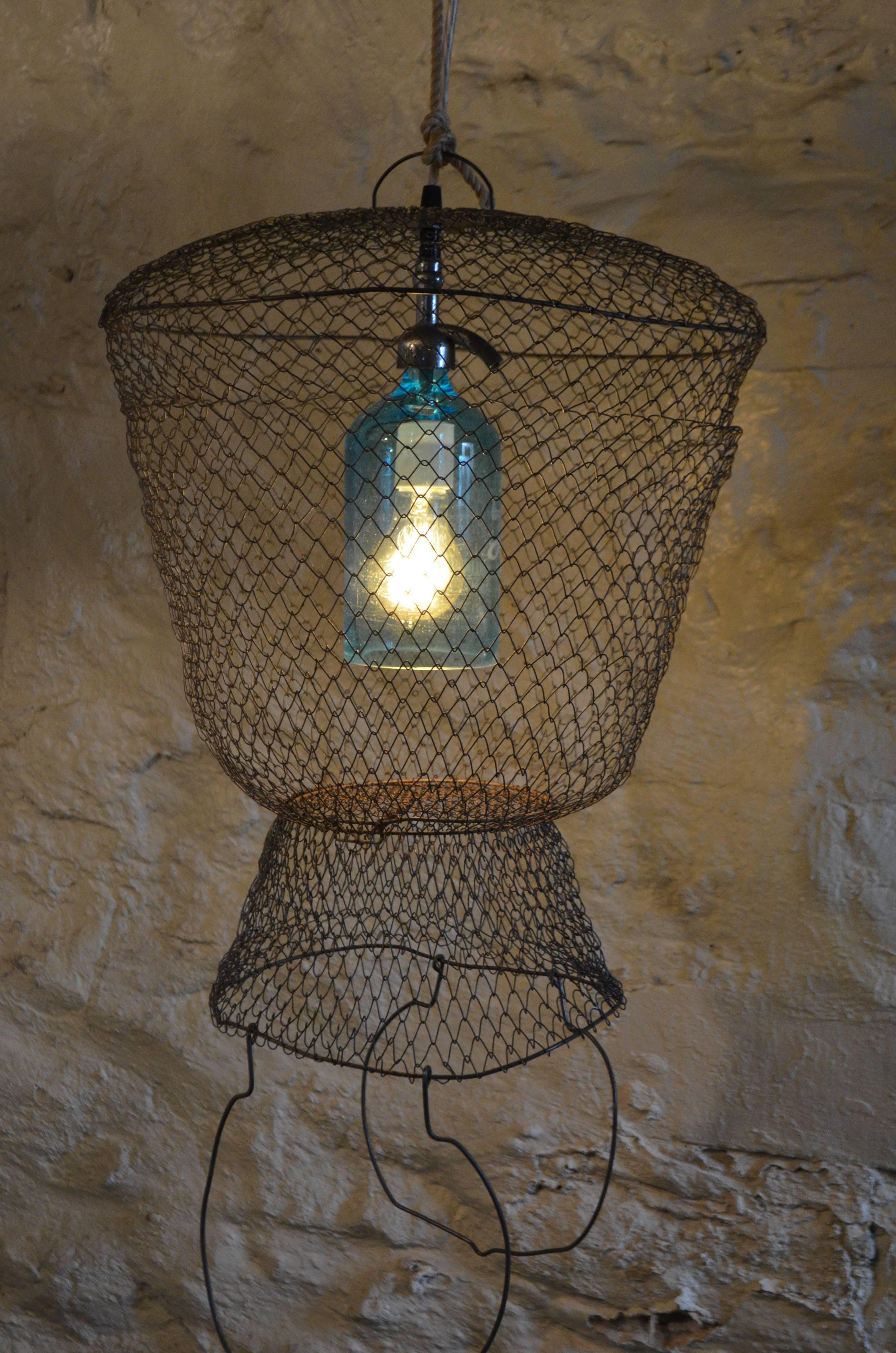 Mid-Century Modern Pendant Light from Seltzer Bottle Suspended in French, Steel Mesh Fish Basket