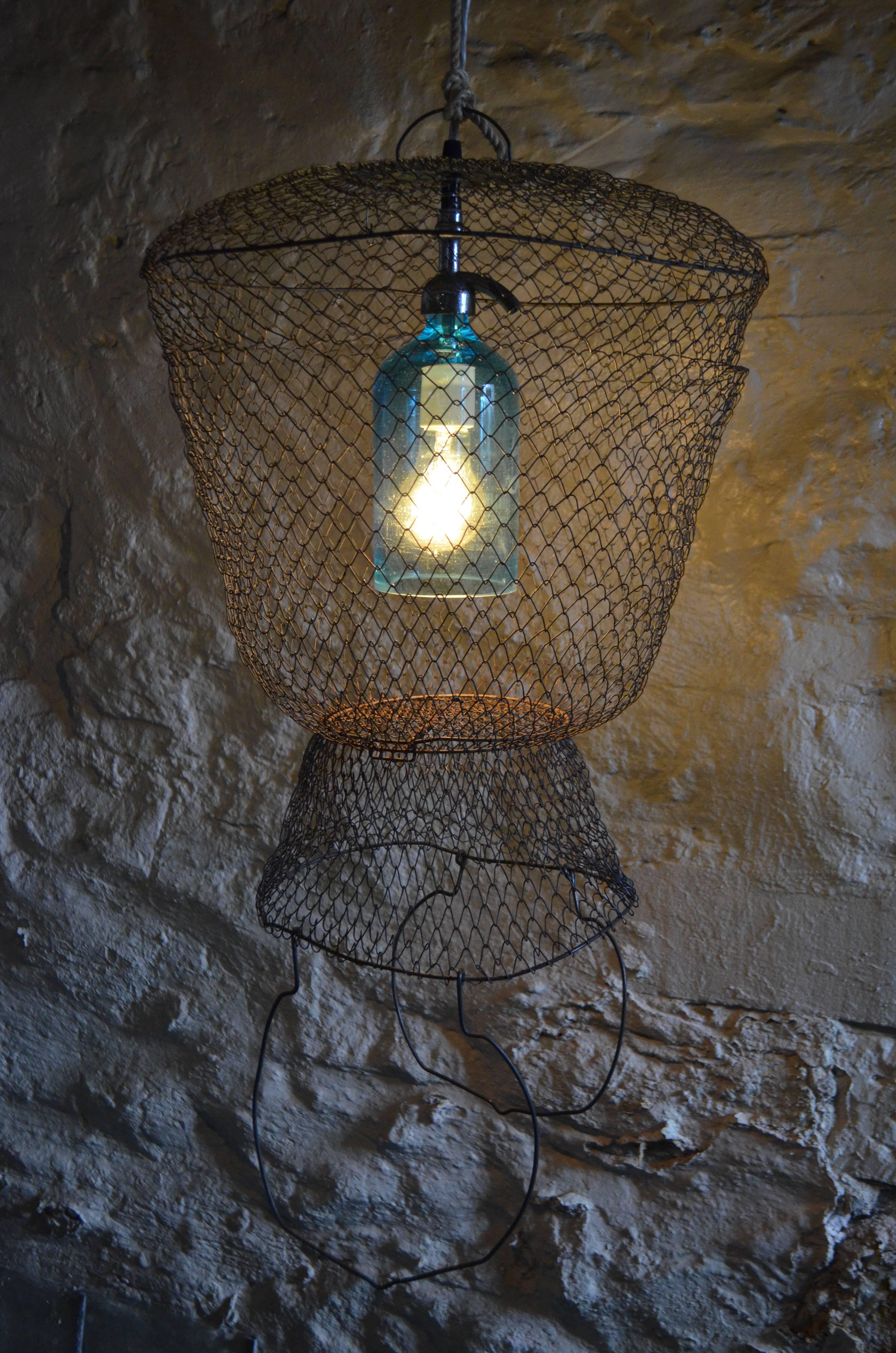 Pendant Light from Seltzer Bottle Suspended in French, Steel Mesh Fish Basket In Excellent Condition In Madison, WI