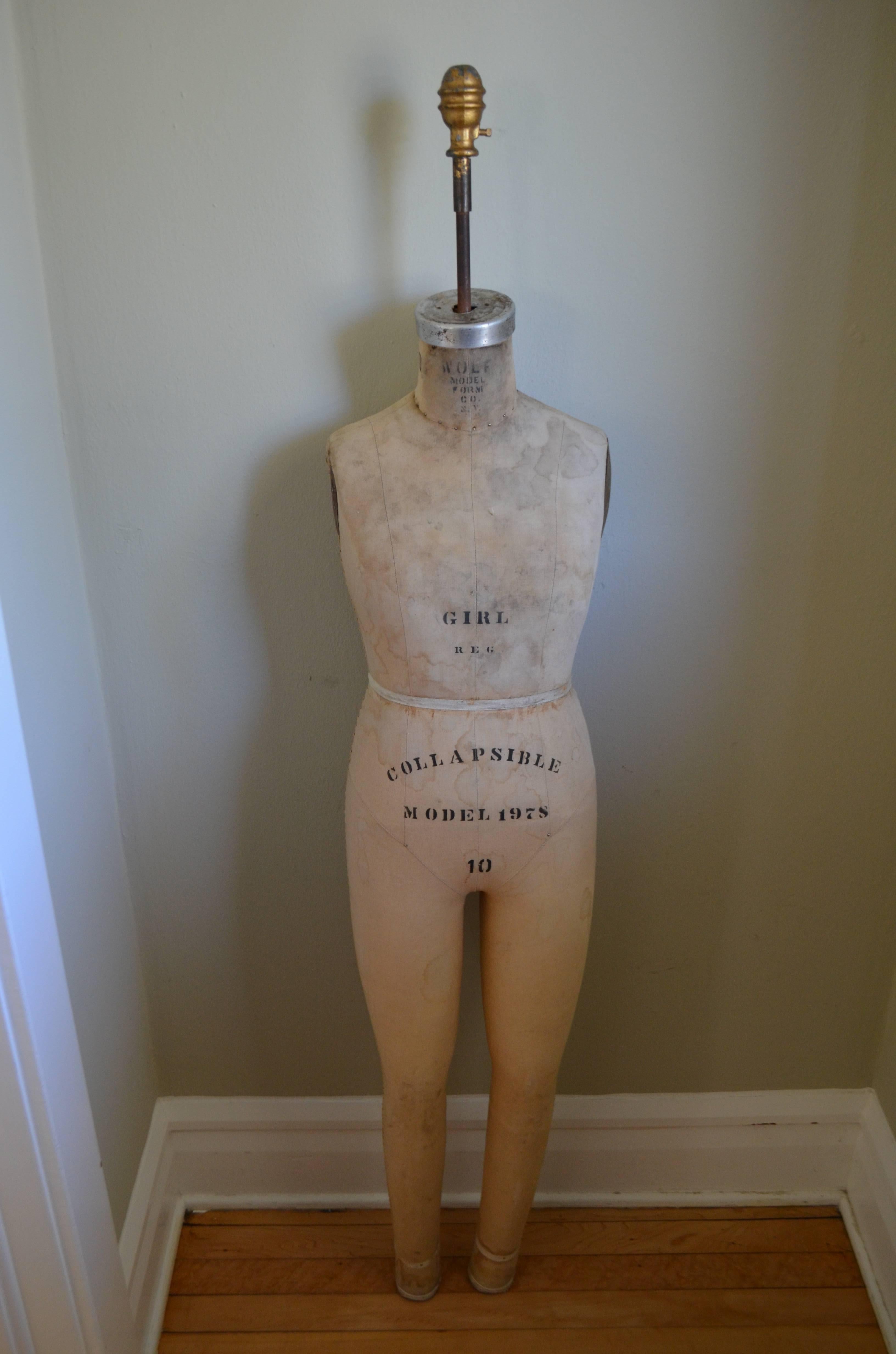 Dress form by Wolf, model 1978, for seamstress work on young girl apparel, size 10. Beautifully sculptural human form. Can be suspended, positioned in a room corner, used to create young girl clothing. Dress her up as a fashionable way to