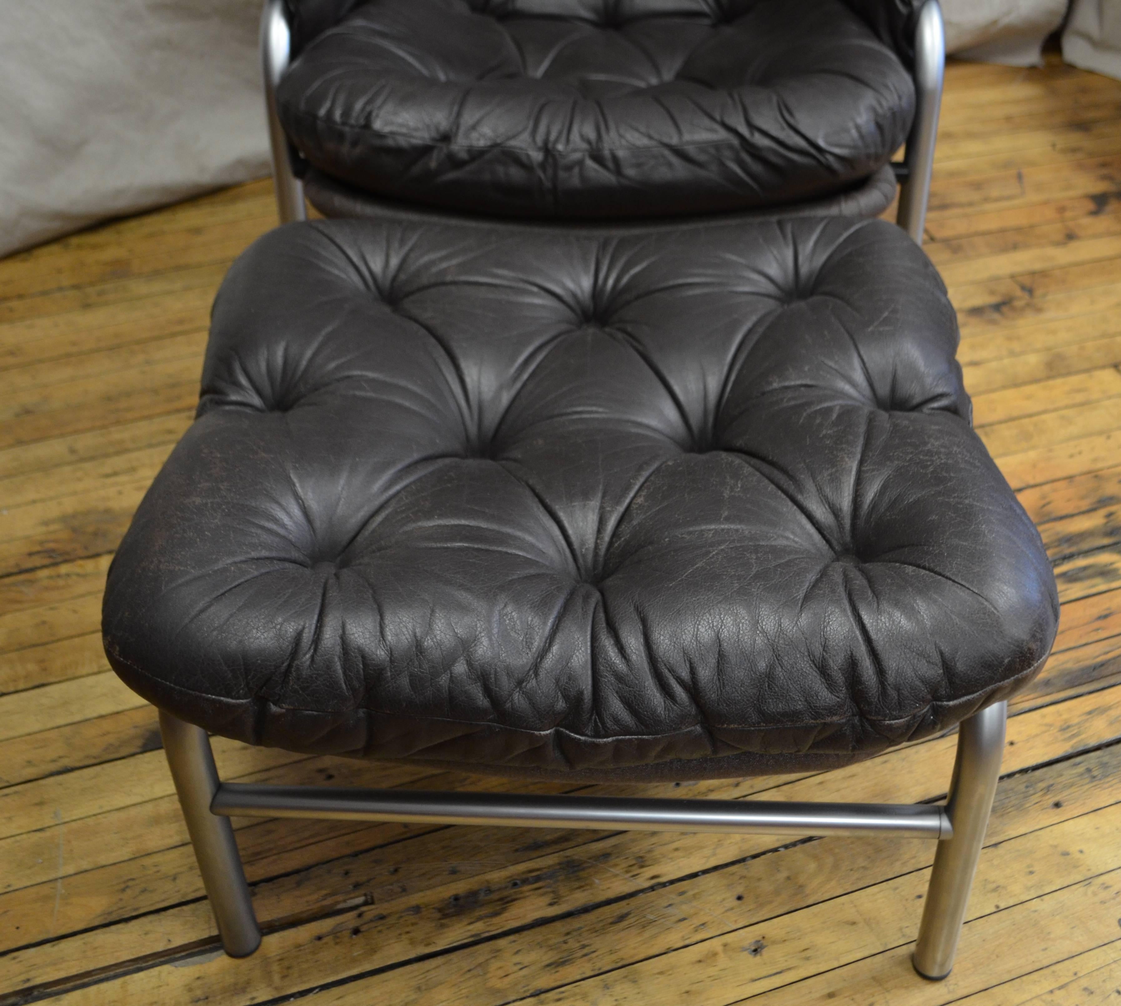 Lounge chair and ottoman from France & Son, designed by Arne Vodder. Made in Denmark and dating back to the early 1960s, prior to the buyout by Cado in the mid-1960s. Chair sits beautifully with leather hand worn velvet smooth to perfection.