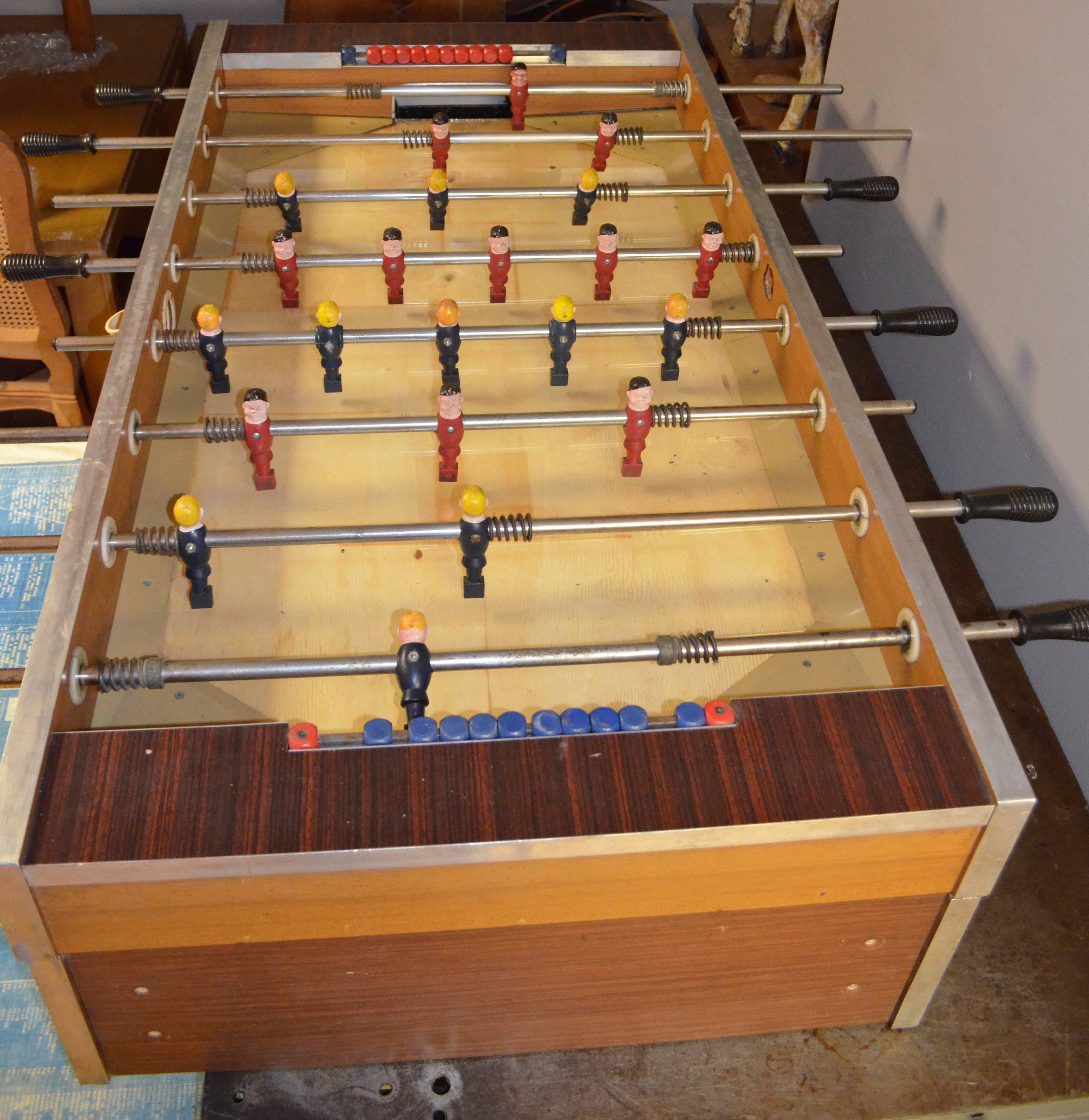 Foosball table from Garlando in Italy, circa 1970s. Great working order. Some minor dings and chips on outside of table. The unit includes rustic 4 x 4 wooden legs that bring it up to playing height. Or add legs of your choosing to augment the
