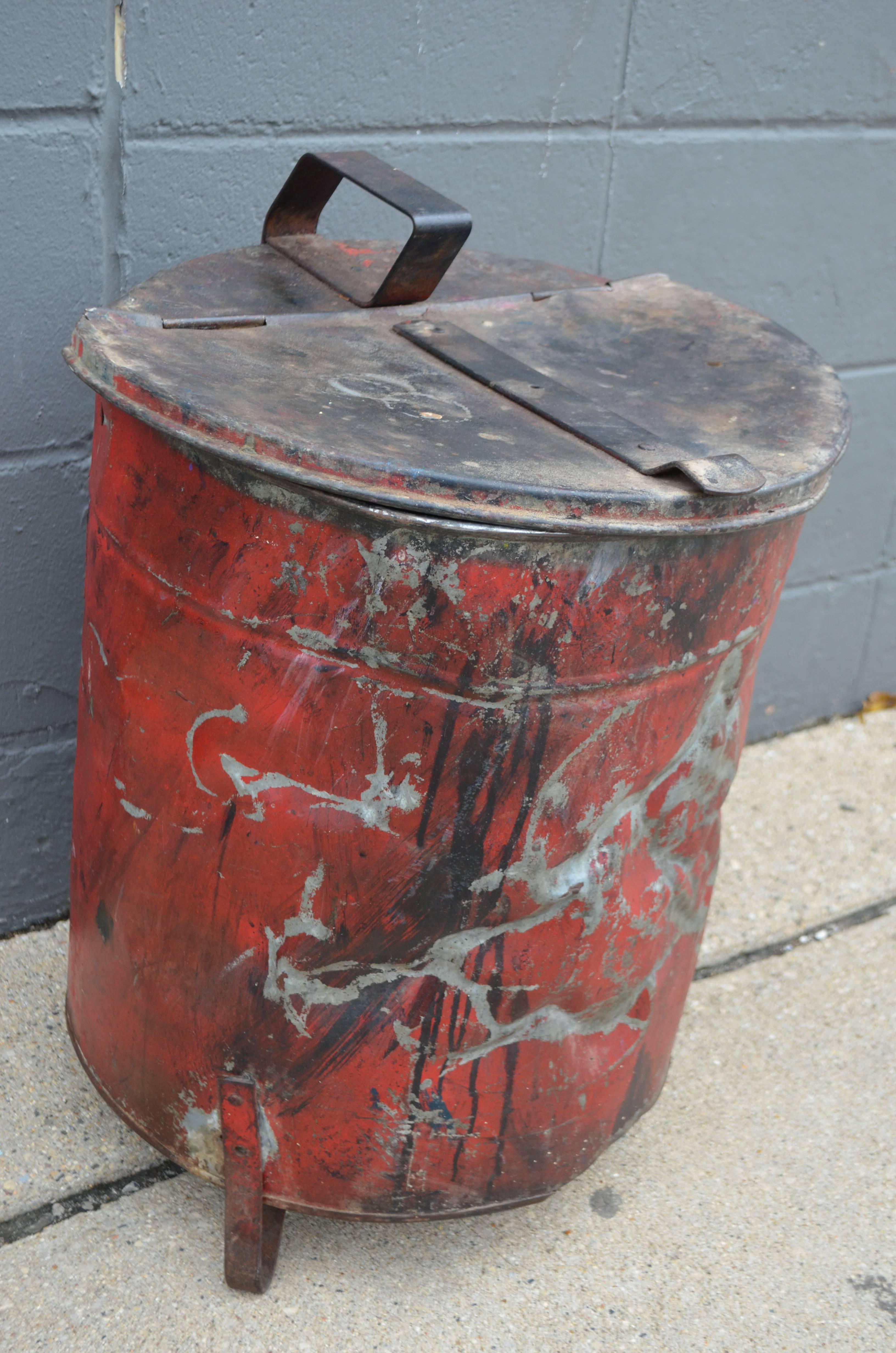 Bathroom bucket from Industrial rag bin with hinged lid. Cleaned and sealed. Wonderful red color with topography of dents. Indestructible with well-earned working-class character.