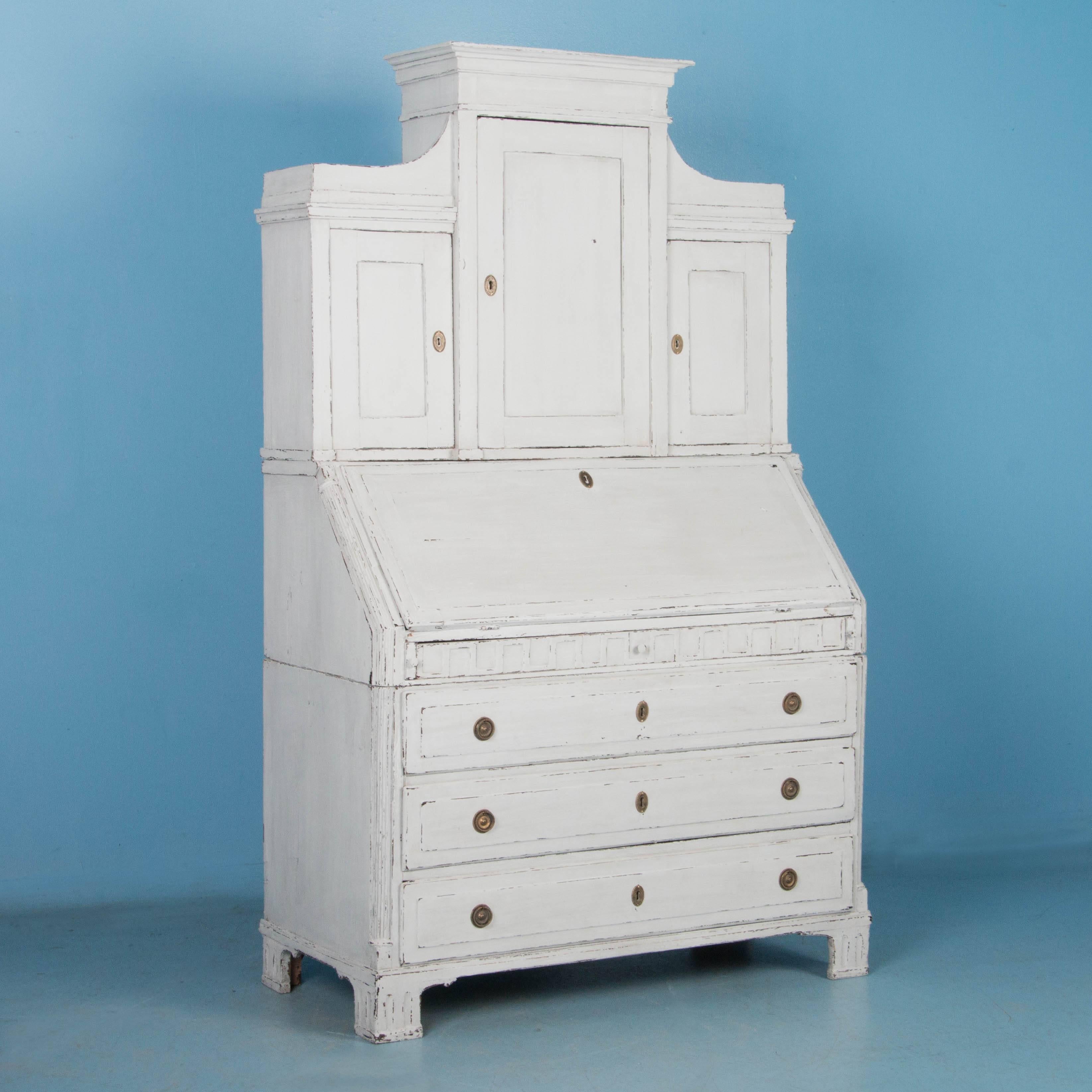 The wonderful proportions, symmetry and craftsmanship are enhanced by the distressed white chalk paint finish on this lovely Louis XIV style secretary. The close up photos #6-9 will help you appreciate the graceful details that create the gentle