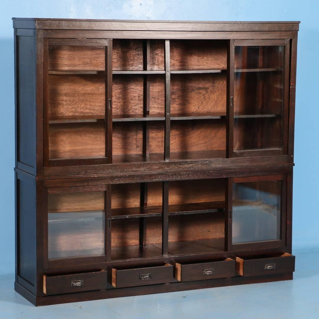 antique bookcase with sliding glass doors