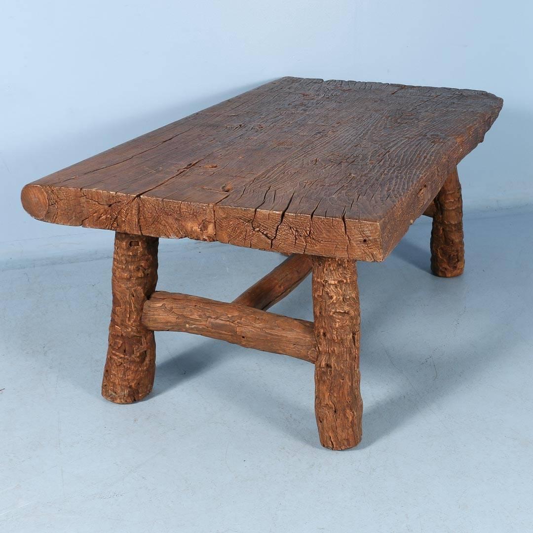 It is the dense worn wood with deep patina that gives this table its dramatic appeal. Please examine the close up photos to appreciate the heavy pinewood top (which is up to 4.5