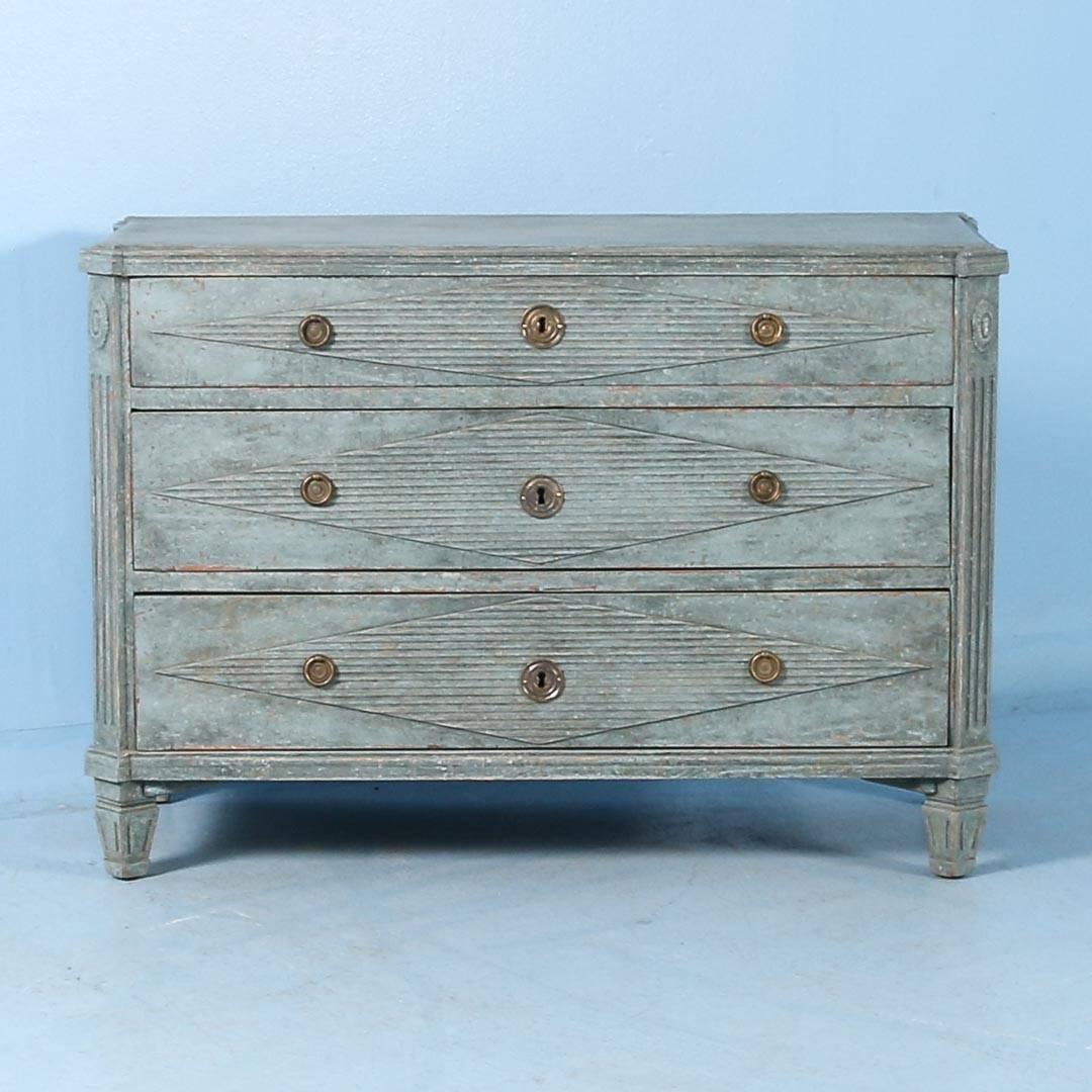 This exceptional Gustavian chest of drawers still maintains its original soft blue painted finish. Please examine the close up photos to appreciate the delicate details of this lovely chest, from the beautiful painted finish, diamond details on the