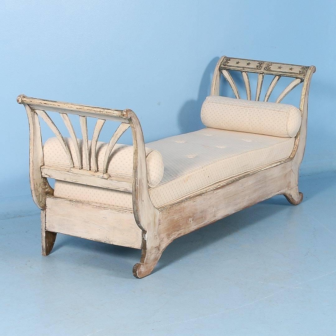 This is a truly exceptional sofa of the Swedish Gustavian period due to the beautiful original paint and carved details. Please enlarge and examine the close up photos to appreciate the softly distressed white of the main body and exquisite blue