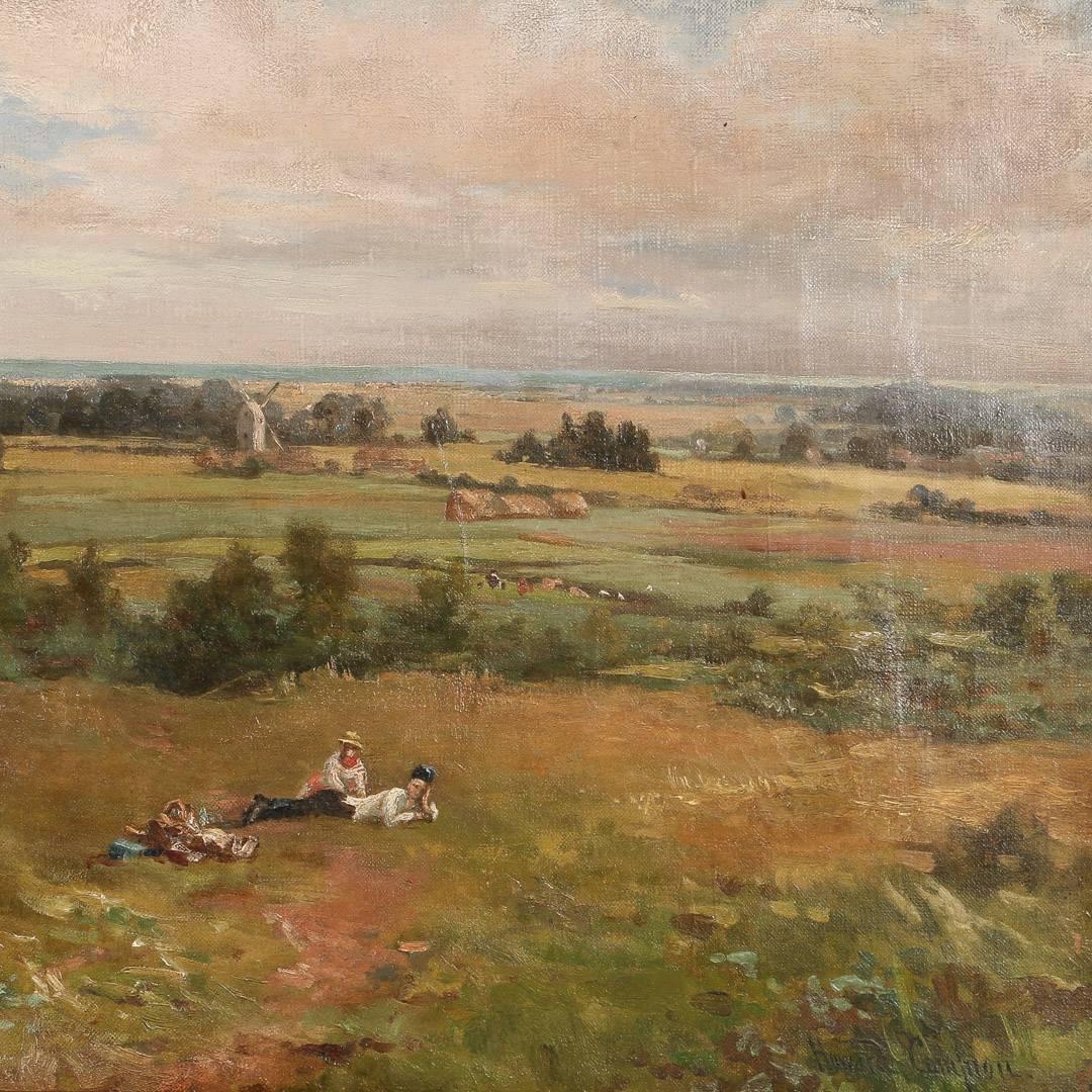 A bucolic antique oil on canvas landscape painting of a couple having a picnic in the English countryside. Signed in the lower right 'Howard Campion'. The artist was born in England in 1839, Studied at the Royal Academy of Arts in London and