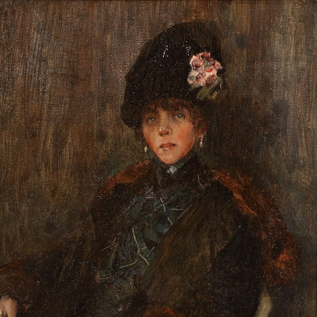 Antique Danish oil on canvas portrait of a lady lounging in a chair signed S. Jurgensen, 1920. Wearing period clothing including a fur lined coat with a hat and high laced shoes, her pearl earrings and rings, indicate a woman of class and stature.