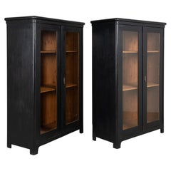 Pair of 20th Century Black Painted Pine Bookcase Display Cabinets