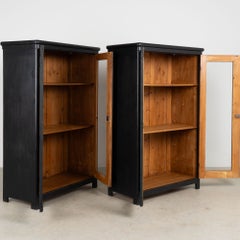 Pair of 20th Century Black Painted Pine Bookcase Display Cabinets