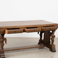 19th Century Danish Carved Oak Desk with Angels and Trestle Base