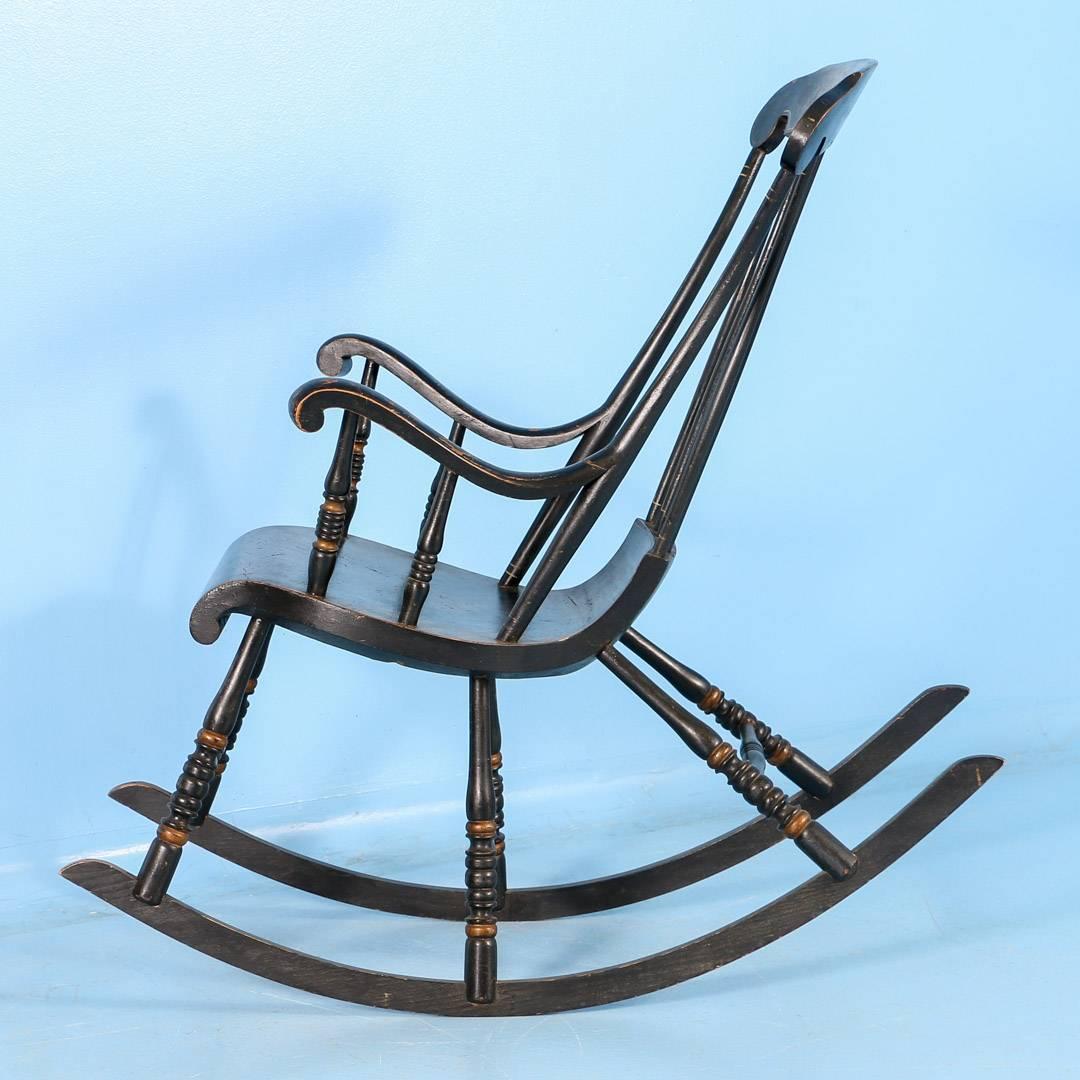 antique black rocking chair