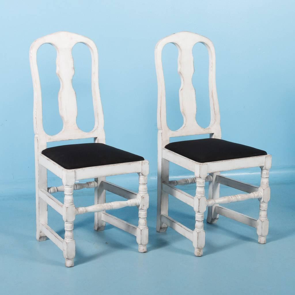 There is a simple country charm to this set of 6 chairs as they originally graced the home of a Swedish farm back in the 1800's.  The new paint has been lightly distressed exposing the natural pine which gives the dining set a wonderful time worn