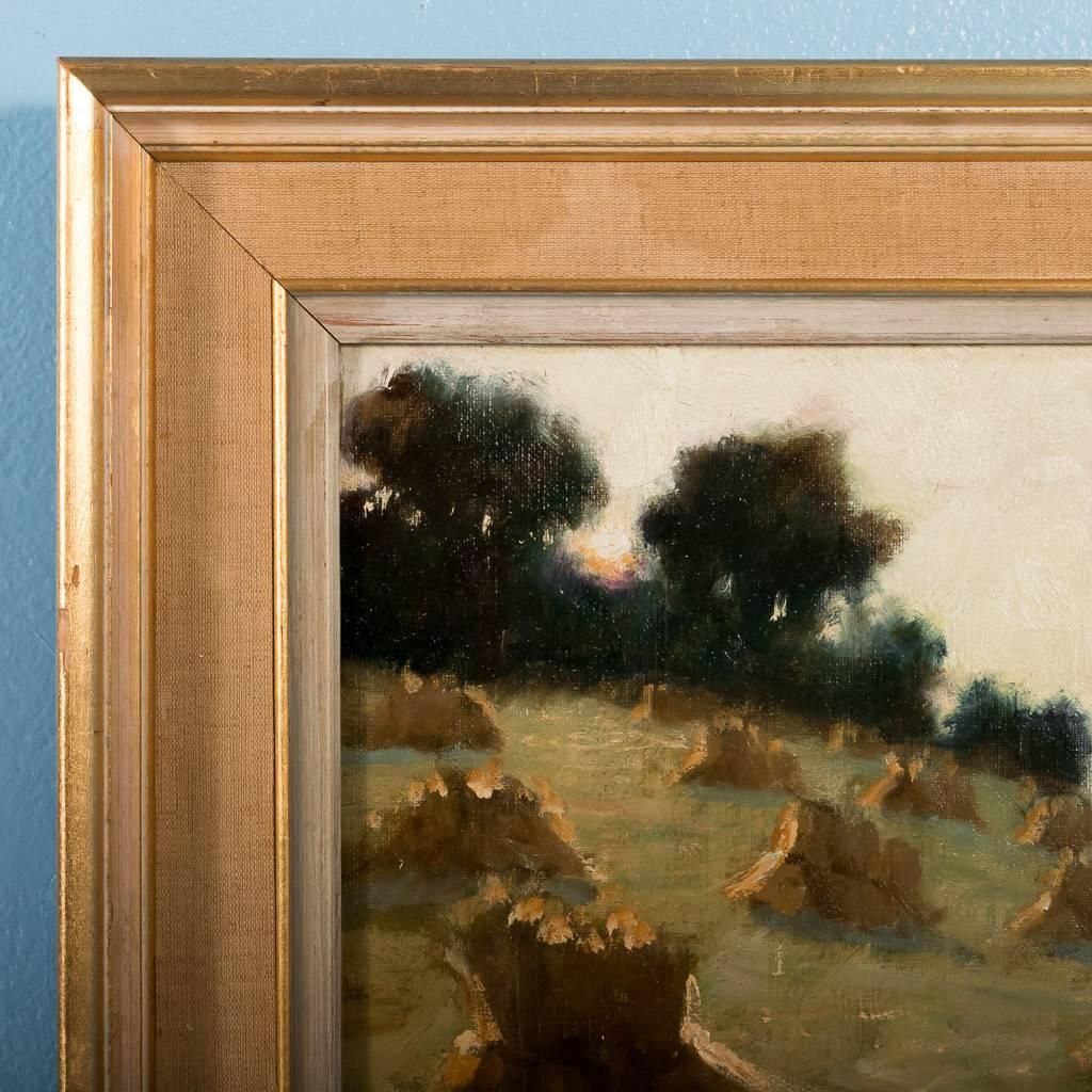 Original impressionist oil on canvas painting from Sweden signed in the lower left and dated 1957. In this bucolic scene of tied bundles of hay on a Hillside, the eye travels upward toward the tree line. In the distance is the horizon and the sky