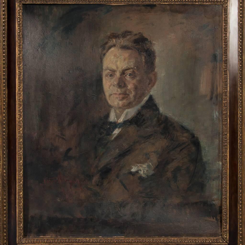 Original signed antique oil painting on artist's board from Germany, portrait of a gentleman, circa 1900-1920. His stiff white collar, black bow tie and pocket handkerchief have the appearance of an early 20th century gentleman of stature. The