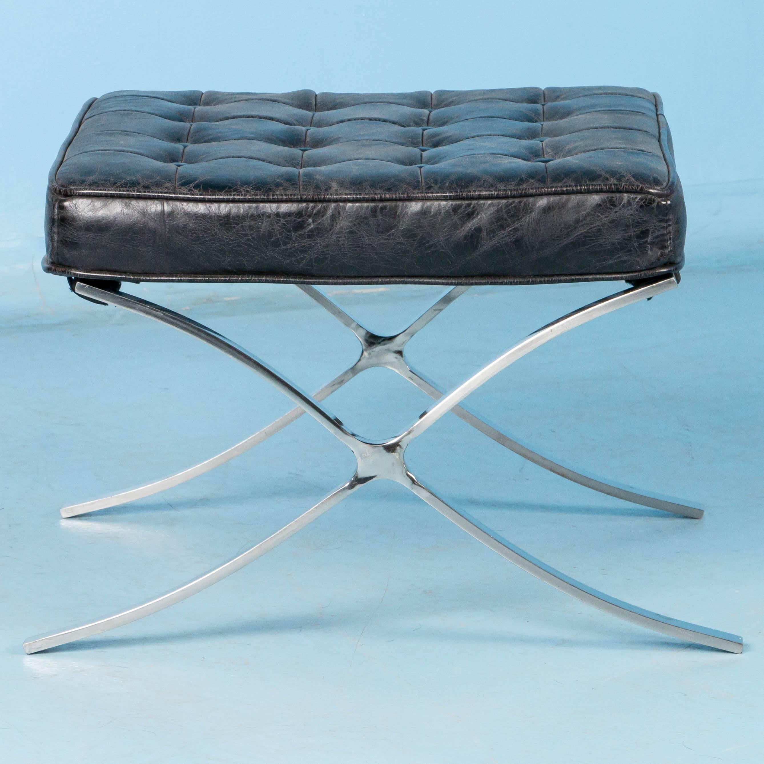 black leather footstool with chrome legs