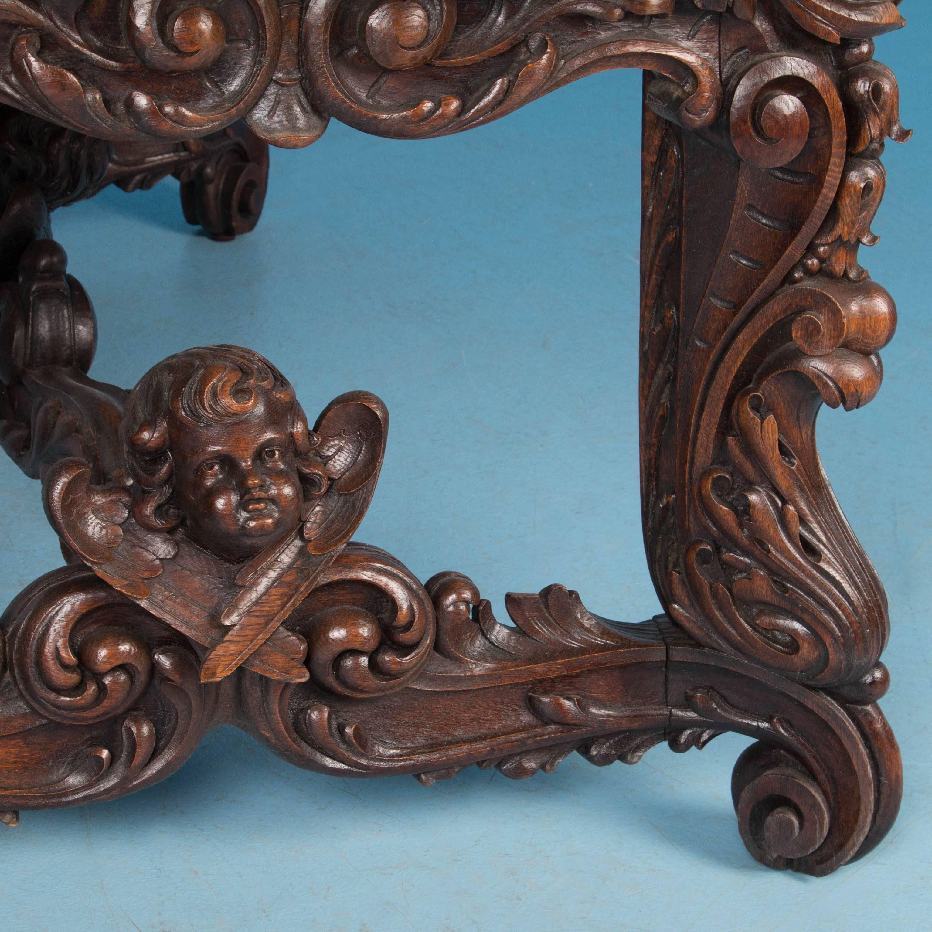 Exceptional Antique Hand-Carved French Library Table with Cherubs 1