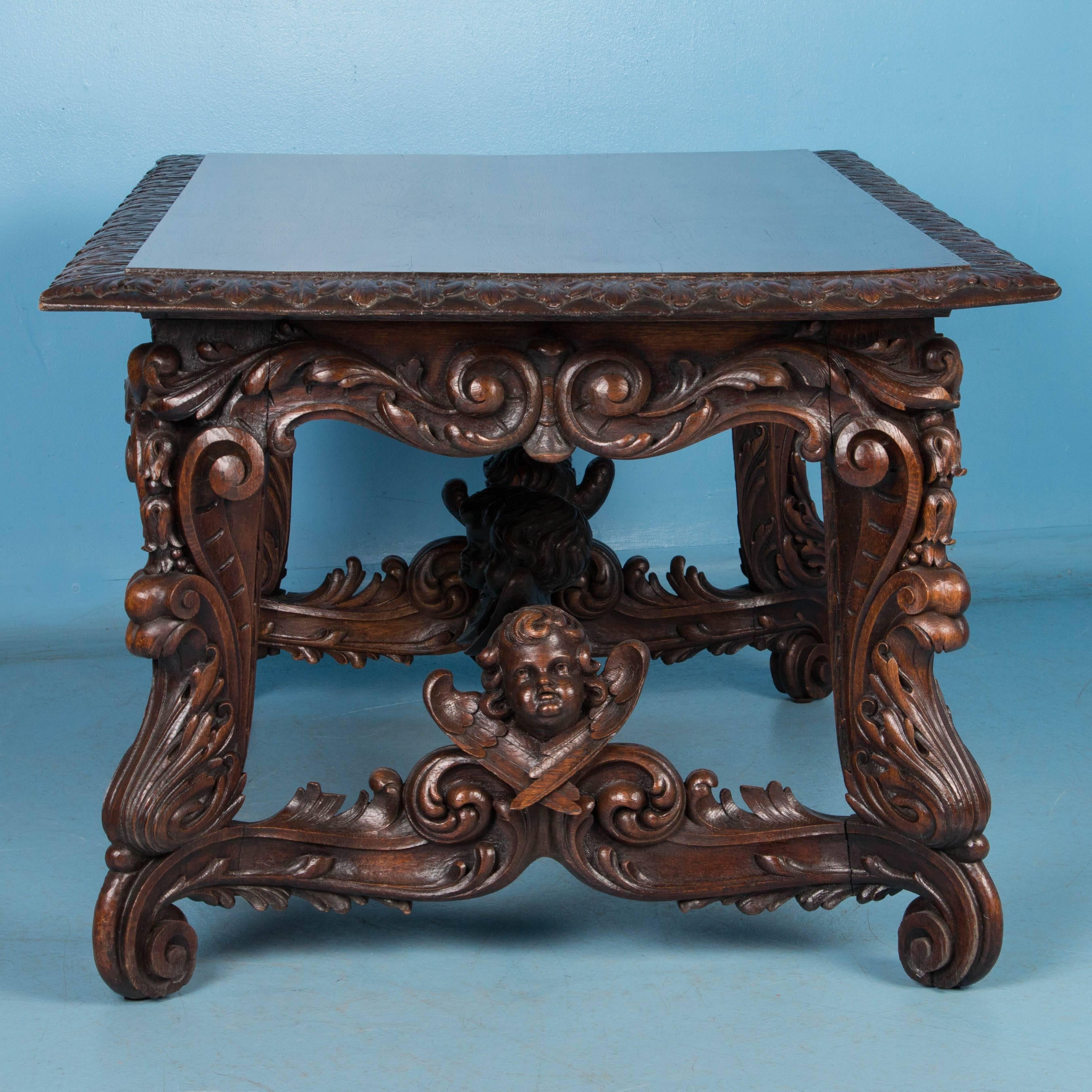 Renaissance Revival Exceptional Antique Hand-Carved French Library Table with Cherubs