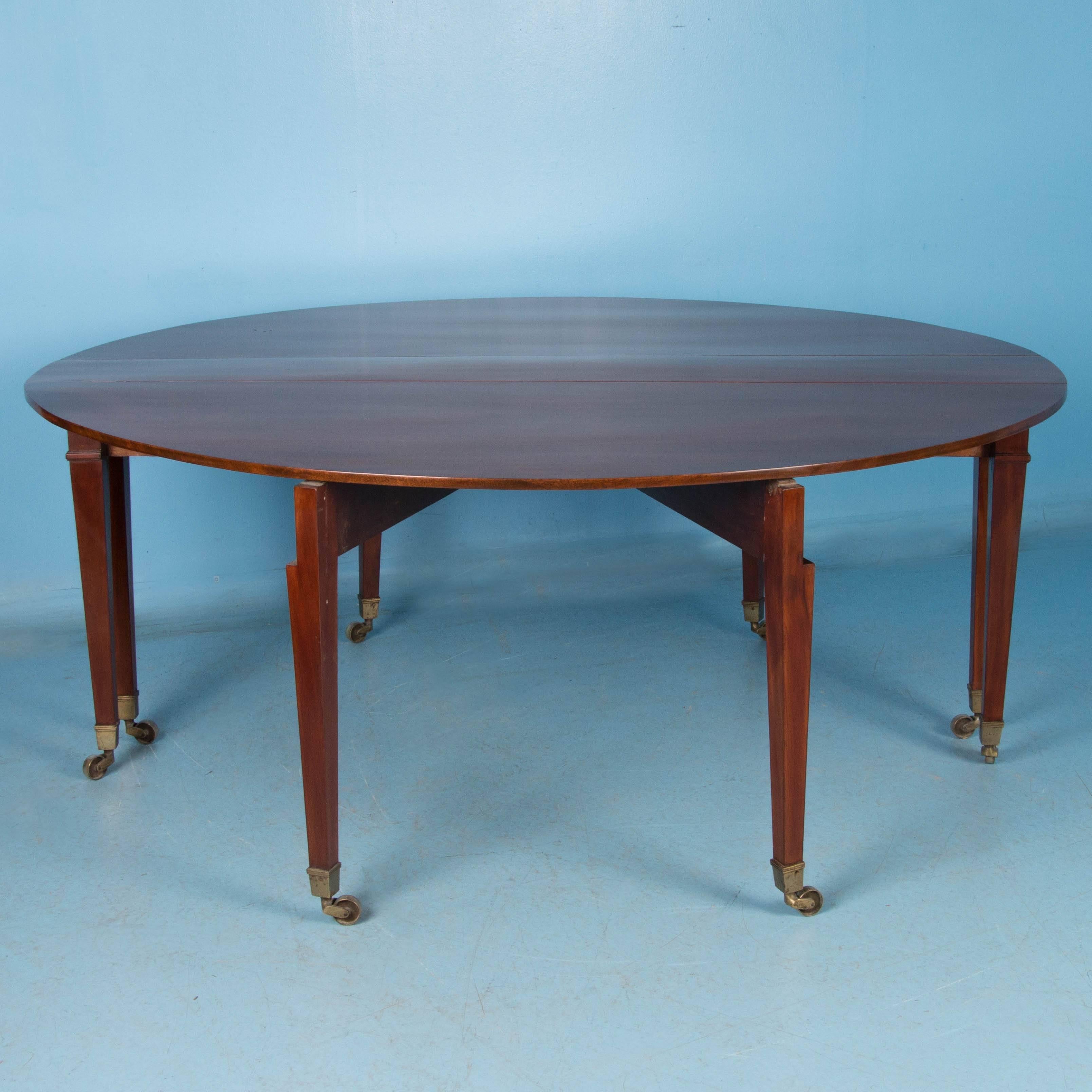This elegant mahogany drop leaf table is very unique due to its large size and gate leg base. From the exceptional Swedish Karl Johan period, the Classic lines balance the stunning mahogany top gracefully. When closed, the table is only 10.75 inches
