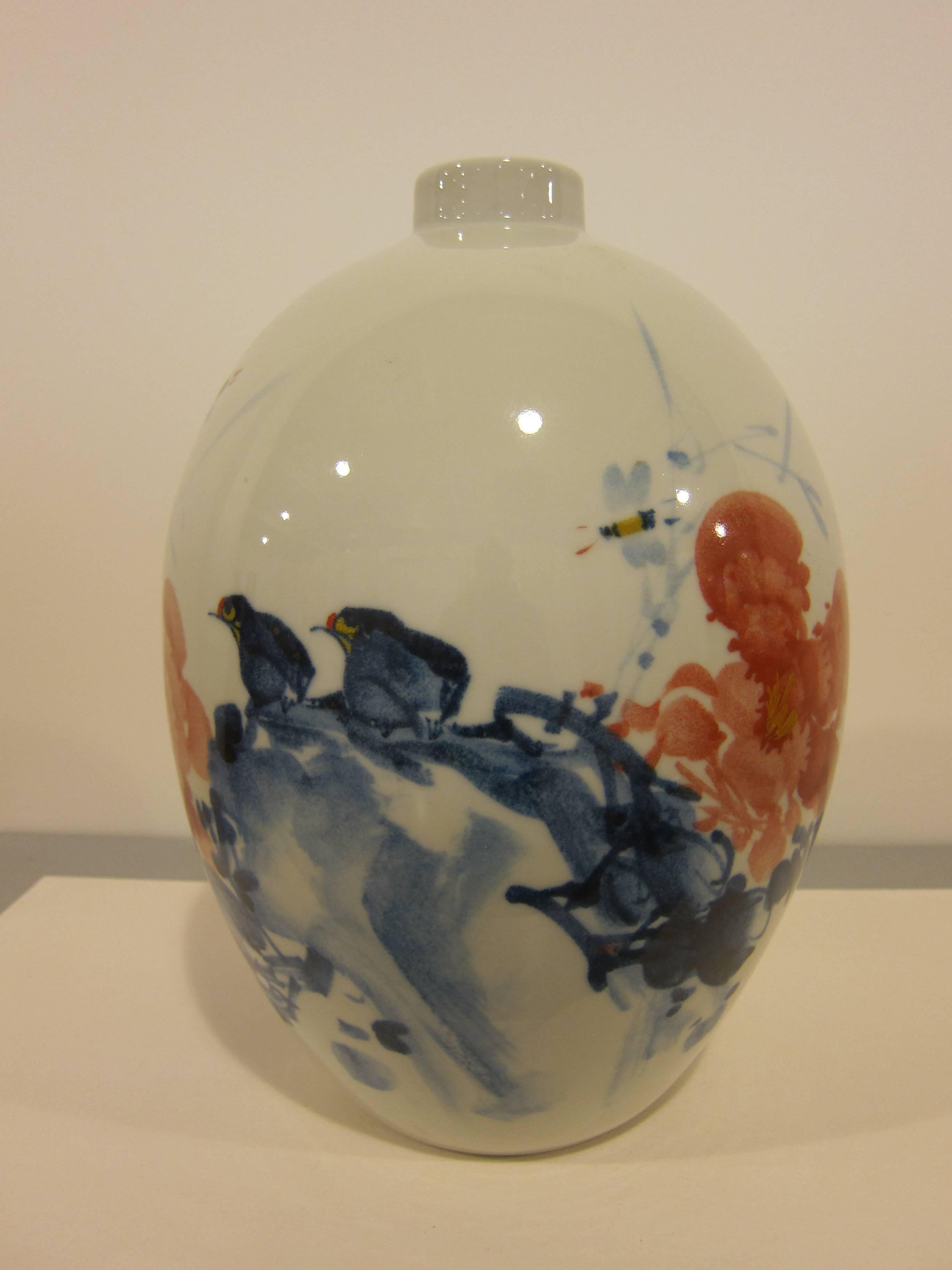 Chinese fine porcelain artisan vases. Beatufily hand formed and hand painted each signed by the artist with a poem.
 