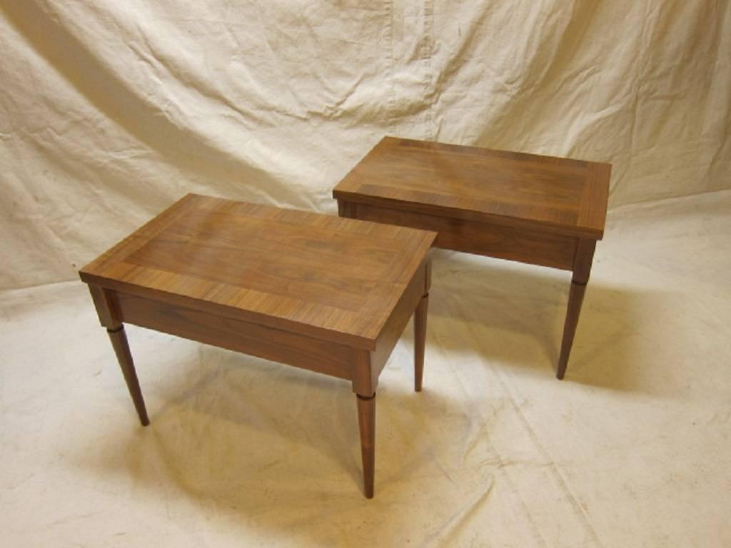 A pair of Robsjohn-Gibbings side tables with drawers. Manufactured by Widdicomb. Banded tops with neoclassical style. Original color with French polish. 
Very good condition.
